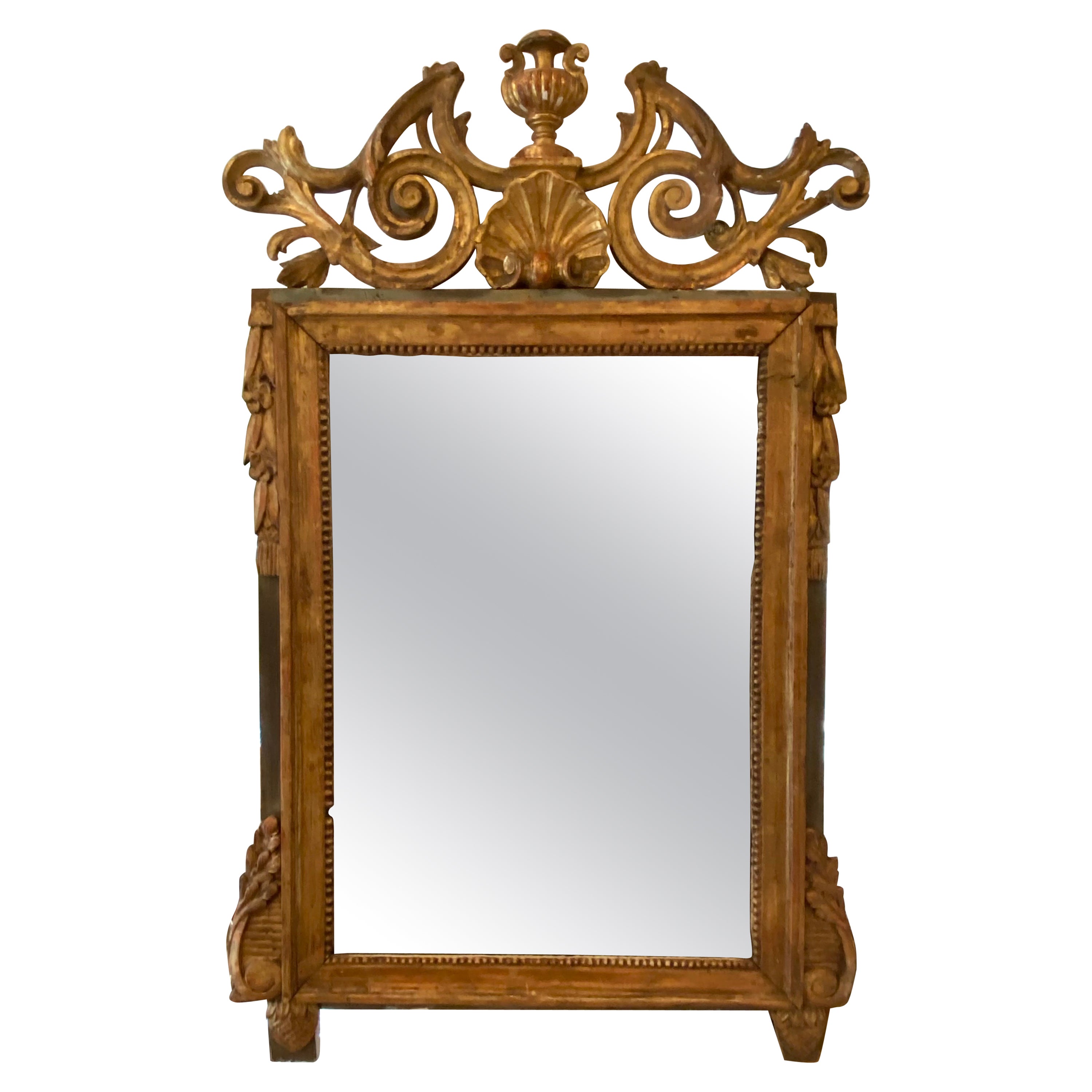 Miroir suédois ancien doré et sculpté