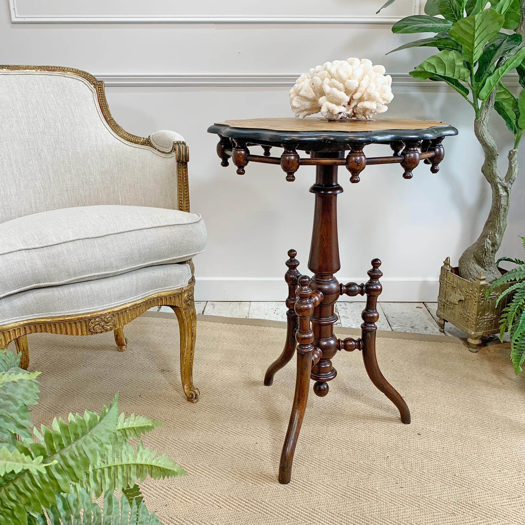 Antique Swedish 'Gypsy' style table
Neo renaissance style dating from the mid-1800s
Scalloped ebonised edge with turned bobbin detail
Probably walnut with a burr walnut veneer top
Central turned pedestal supported on a trio of turned, bentwood