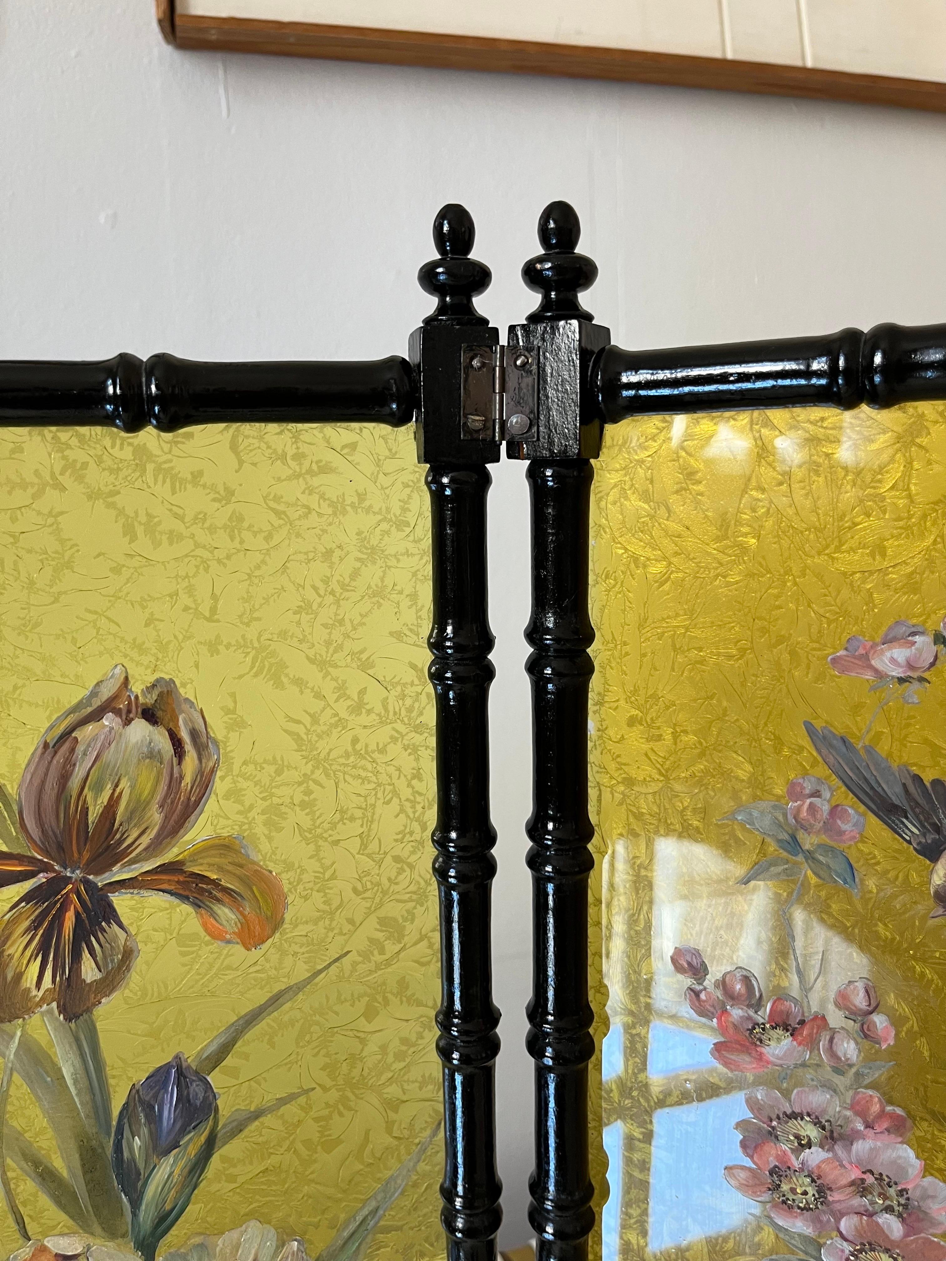 Antique Swedish Hand-Painted Decorative Three-Panel Glass Screen

Exquisite antique Swedish hand-painted decorative three-panel screen. Crafted with finely carved and intricately detailed black-painted wood frames featuring beautiful curved forms,