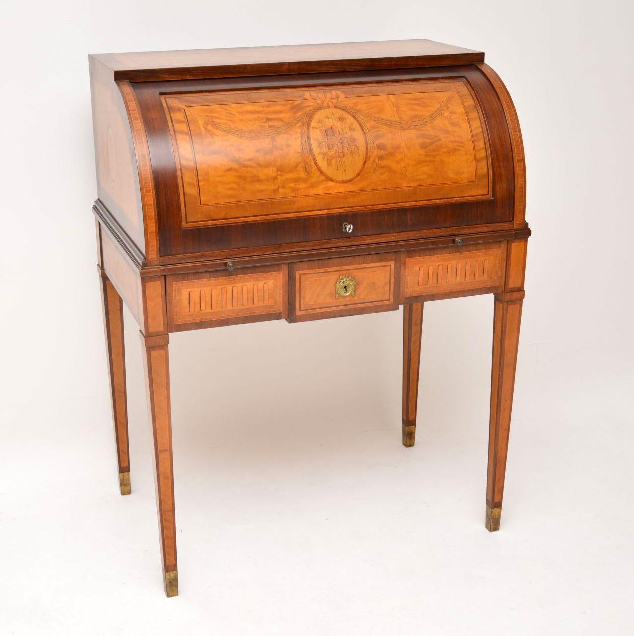 Very elegant antique Swedish cylinder top desk in a Neoclassical style and with some wonderful details. It’s rosewood, satinwood, kingwood & other exotic woods. This bureau is in good original condition & I would date it to around the 1920-1930s