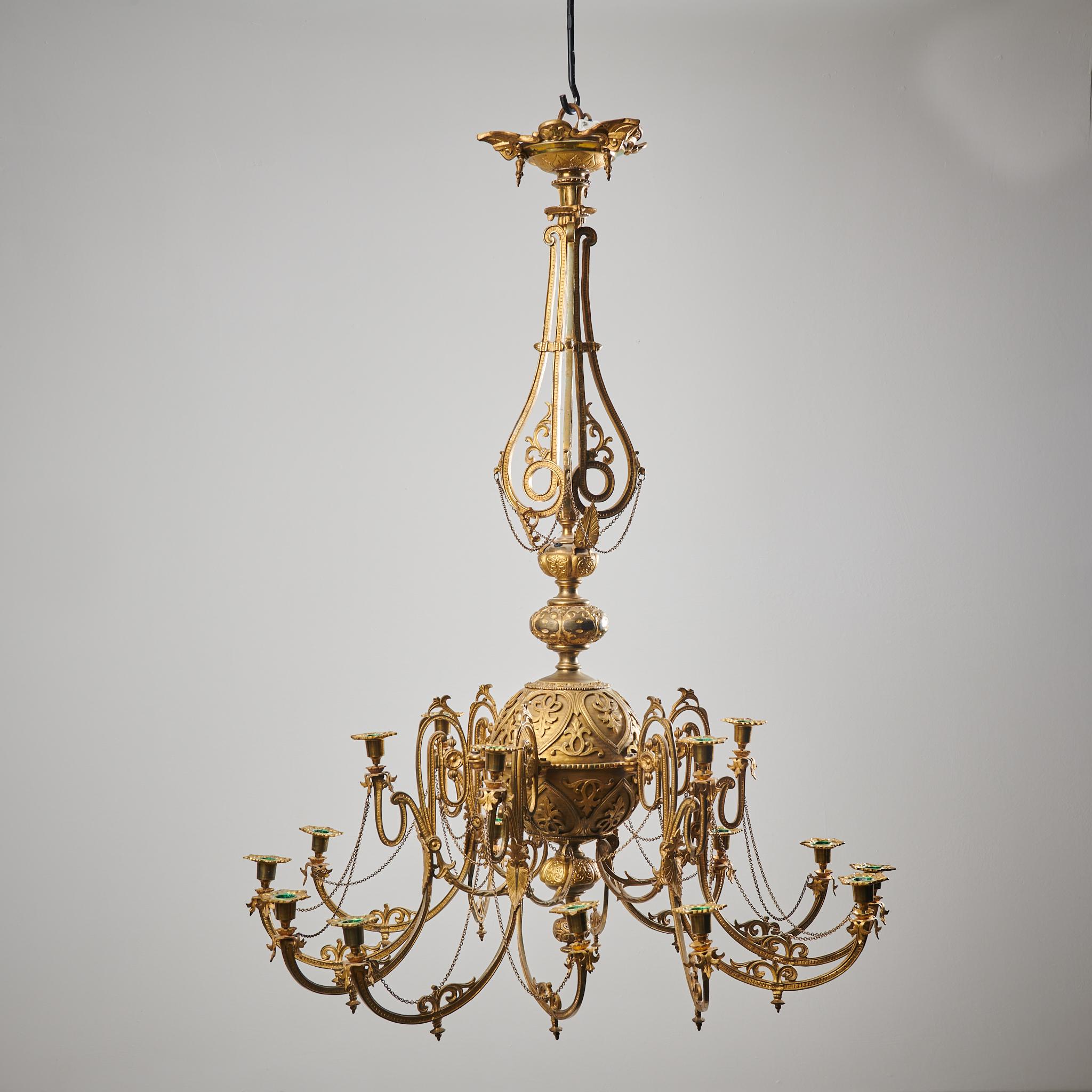 Antique Swedish bronzed chandelier made during the mid 1800s, around 1850 to 1860. The chandelier is made in bronzed metal with a richly decorated round frame. It has curved arms and an intricate decor in the form of chains, leaves and other