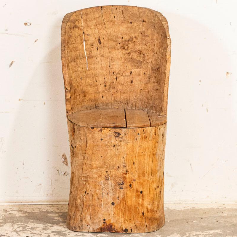 A kubbestol is a traditional Scandinavian chair made from a log. Every knot, crack, and sign of wear adds to the intriguing appeal of this hand-hewn stool. Notice in the photos there is an old repair where someone filled one of the cracks along the