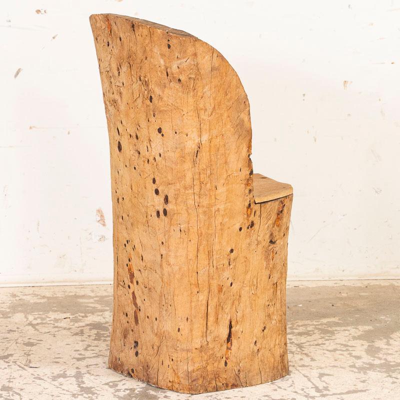 carved log chair
