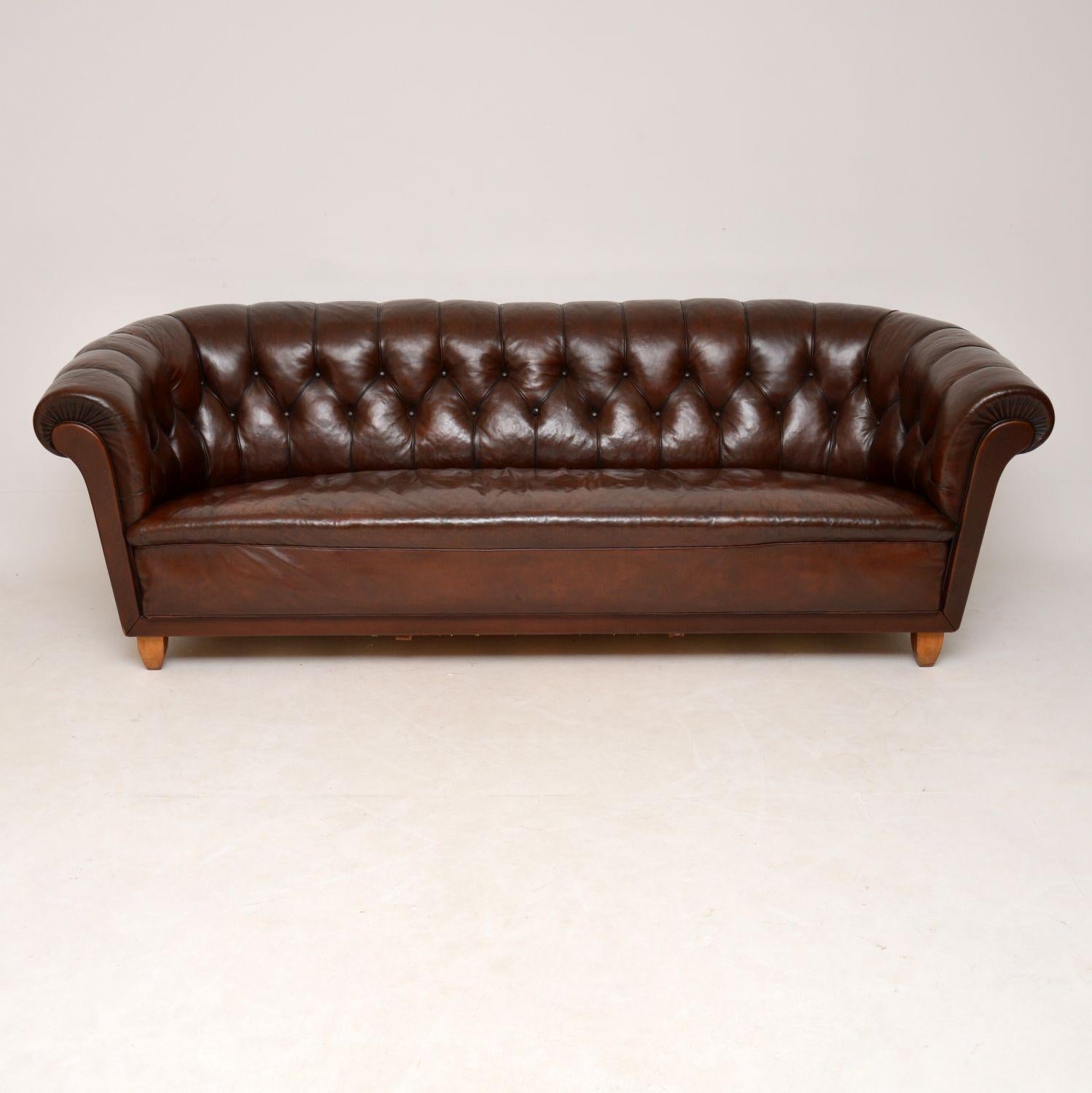 This antique Swedish Chesterfield sofa still has the original leather on it and the color is wonderful. It’s a Swedish take on an English Victorian Chesterfield & is very stylish. The leather is deep buttoned & has been professionally polished,
