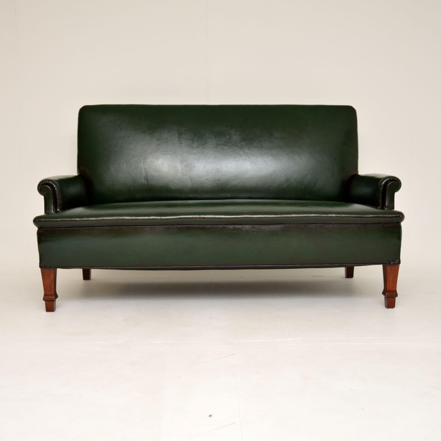 A beautiful and very impressive antique Swedish leather sofa. This was recently imported from Sweden, it dates from around the 1900-10 period.

The quality is amazing, this is extremely sturdy and well built. The sprung seating area is very