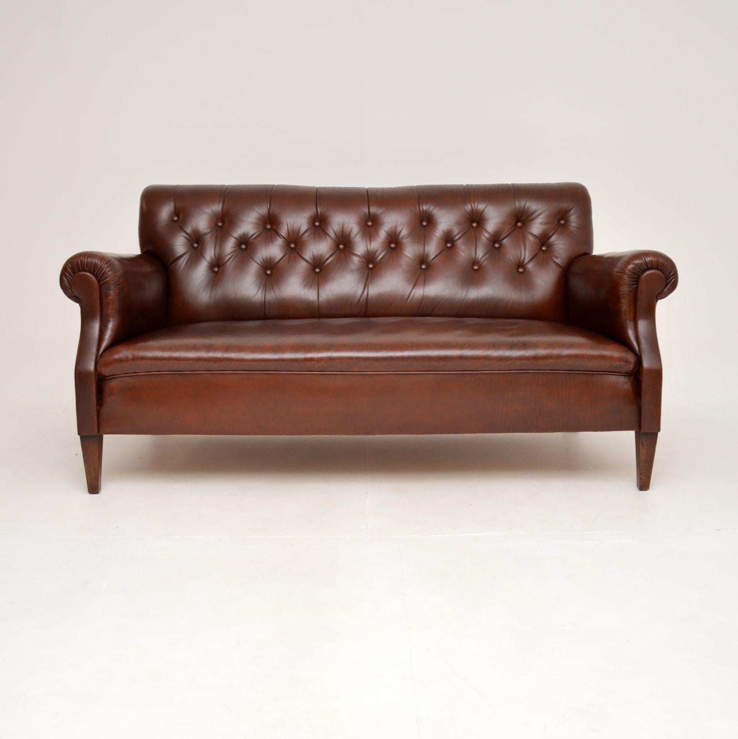 An outstanding antique Swedish leather sofa, recently imported from Sweden and dating from the 1900-1920 period.

This is of amazing quality, it is well sprung, generous and very comfortable to relax in. The brown leather has a gorgeous colour tone,