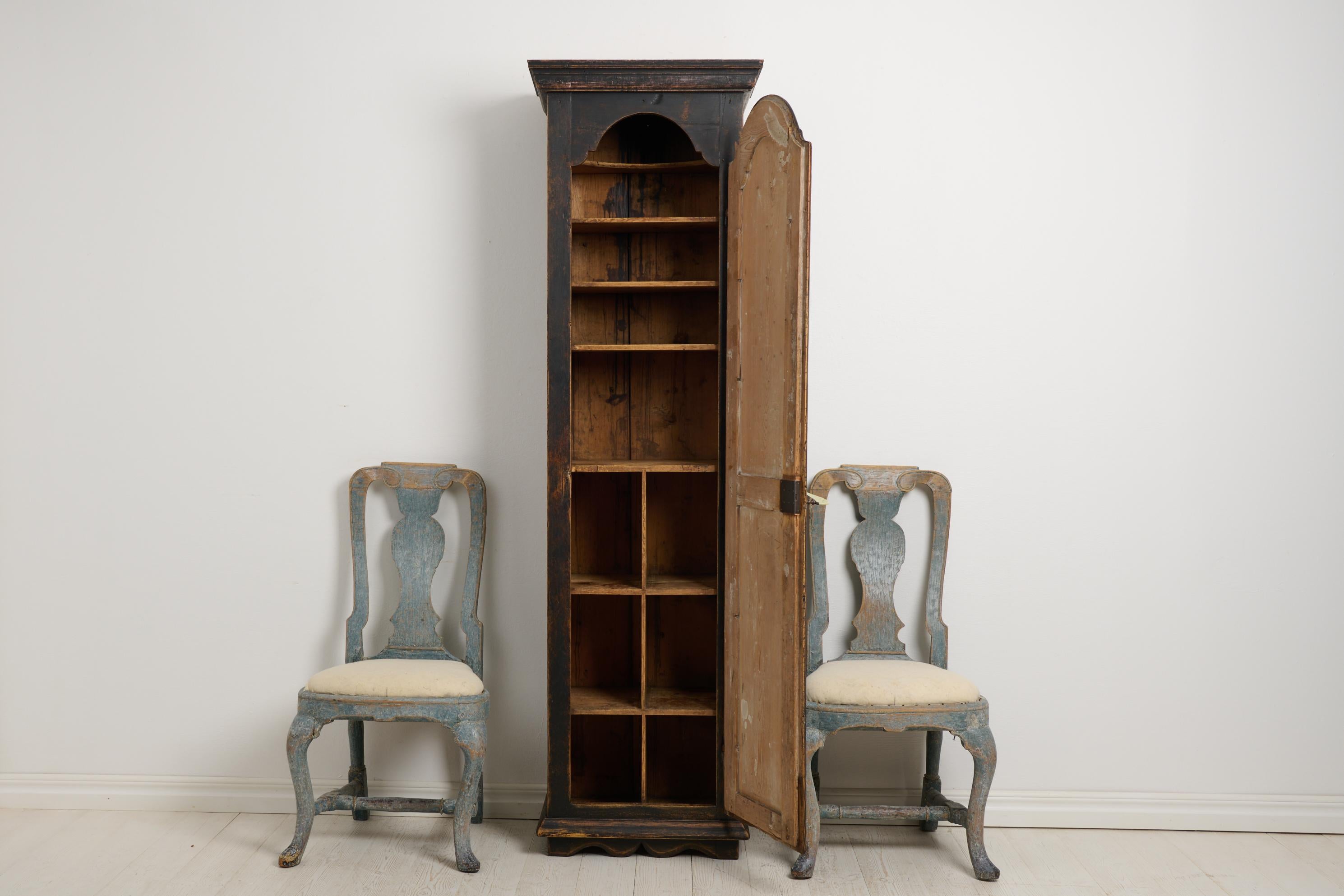 Country Antique Swedish Narrow and Tall Cabinet with Shelves and Distressed Black Paint For Sale