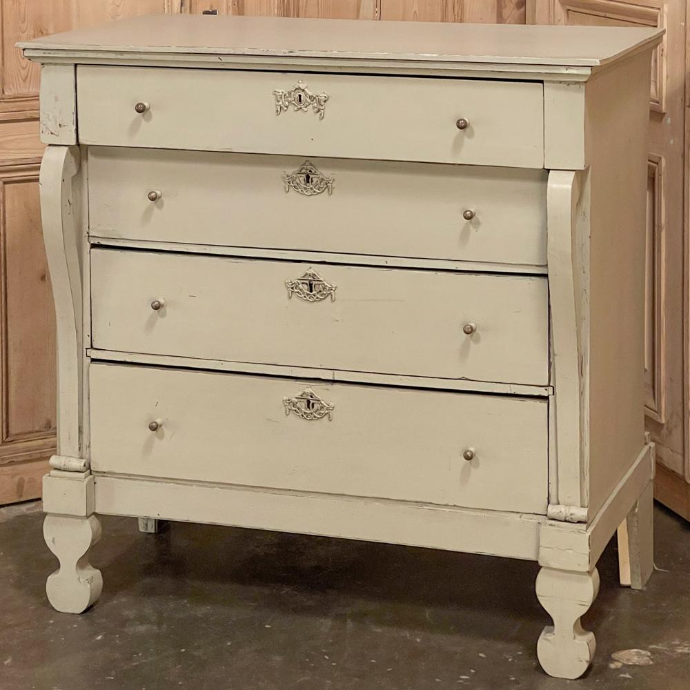 Hailing from Sweden where tailored rustic furniture predominates the countryside, this Antique Gustavian Commode features the simple Swedish lines and wonderful functionality of the breed. Elegant painted finish is gray with a hint of beige, and has