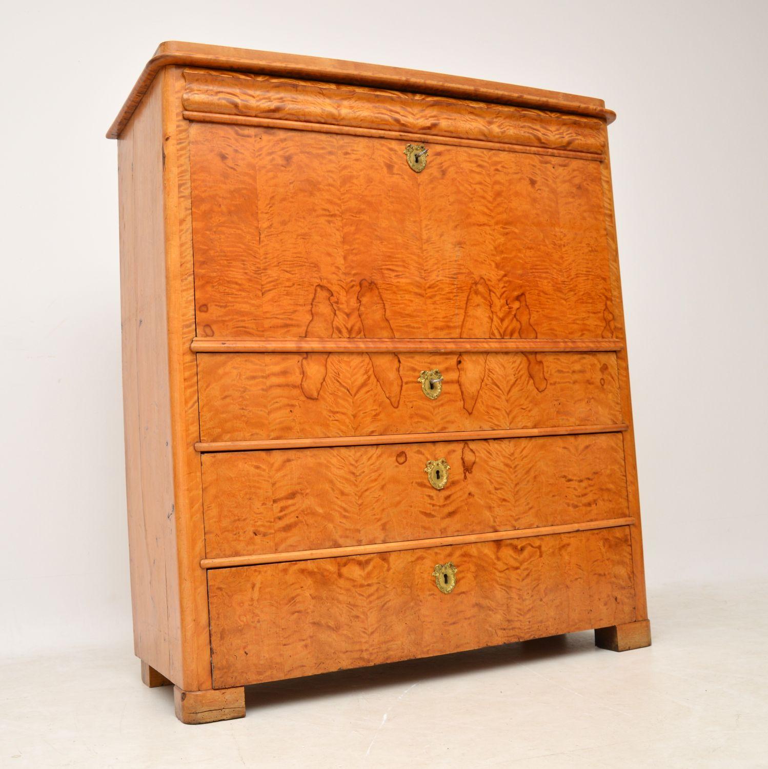 Antique Swedish Biedermeier satin birch secretaire with a stunning interior and full of character. I would date this piece to around the 1850s period and it’s in good original condition, with some of age related markings which we have shown in the
