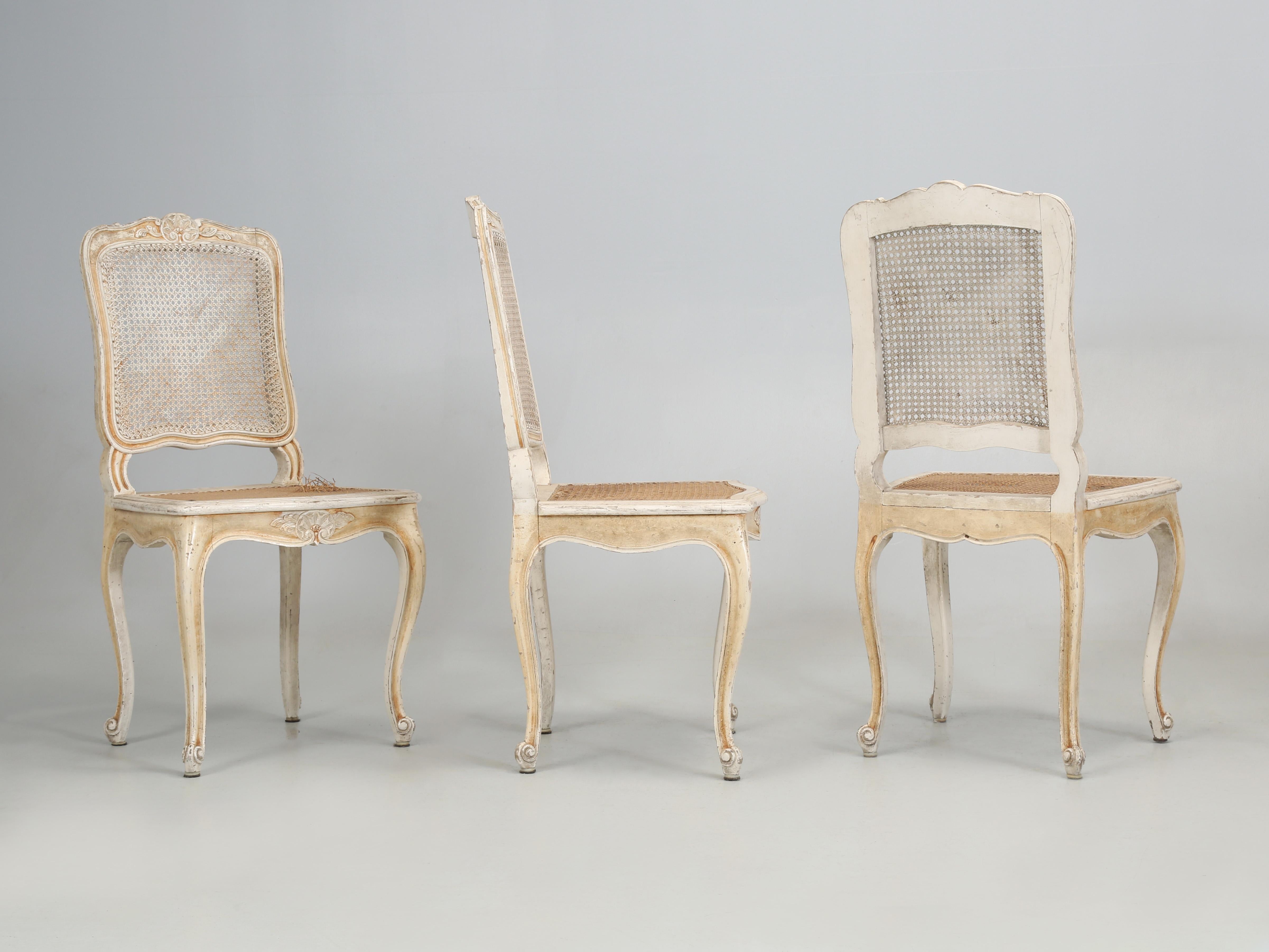 Antique Set of (6) Old Painted Swedish Dining Chairs in their original unrestored condition. Like most old cane dining chairs, the canework has seen better days and is way beyond repair. There are two logical solutions; purchase cane sheets and