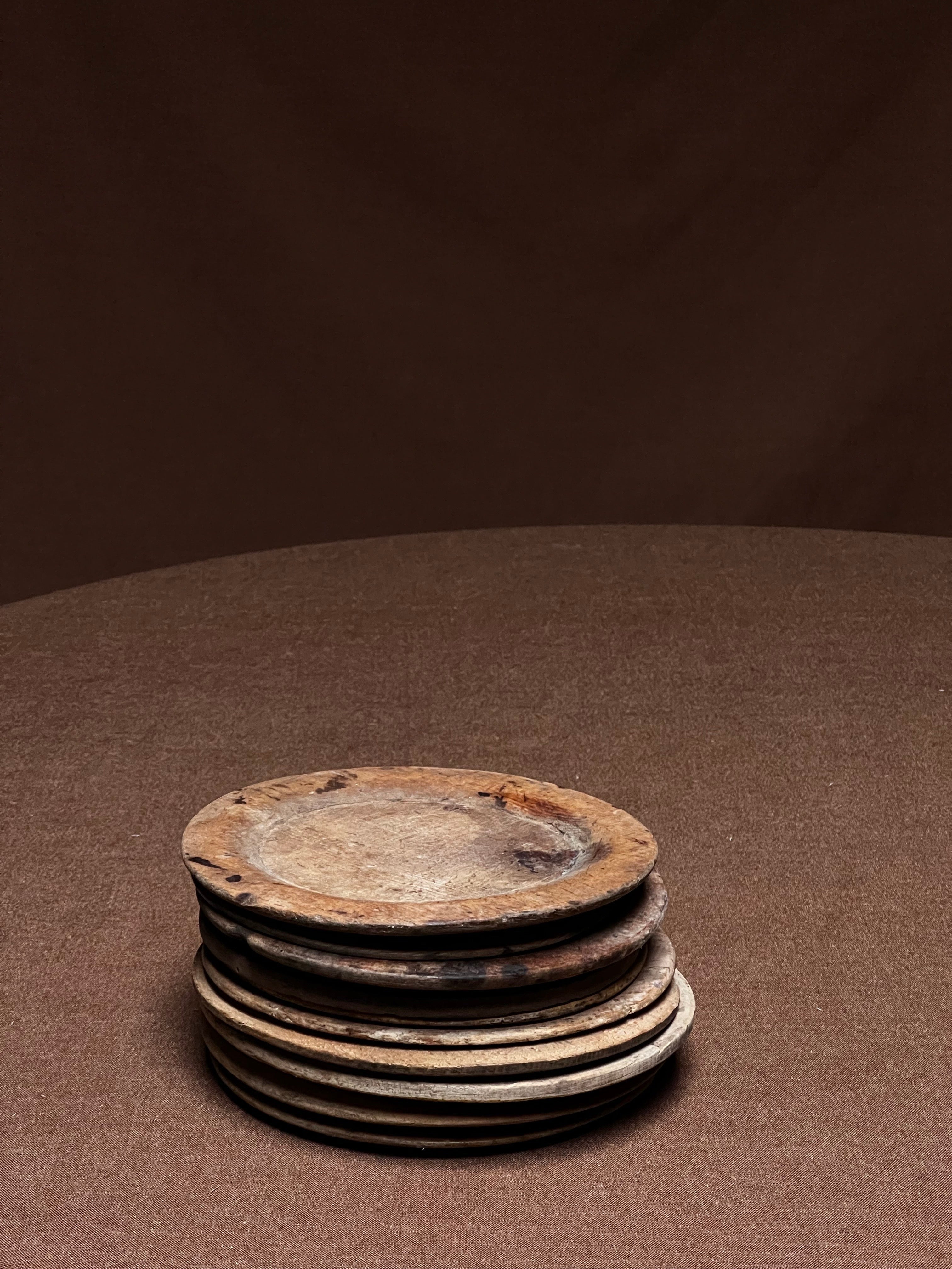 Swedish antique  birch hand made wooden plates. Made to be used as a dining plates. Fine quality of handwork. these are true piece from the early 19 century. Beautiful patina on the inside and outside as well. Engraved with some initials under the