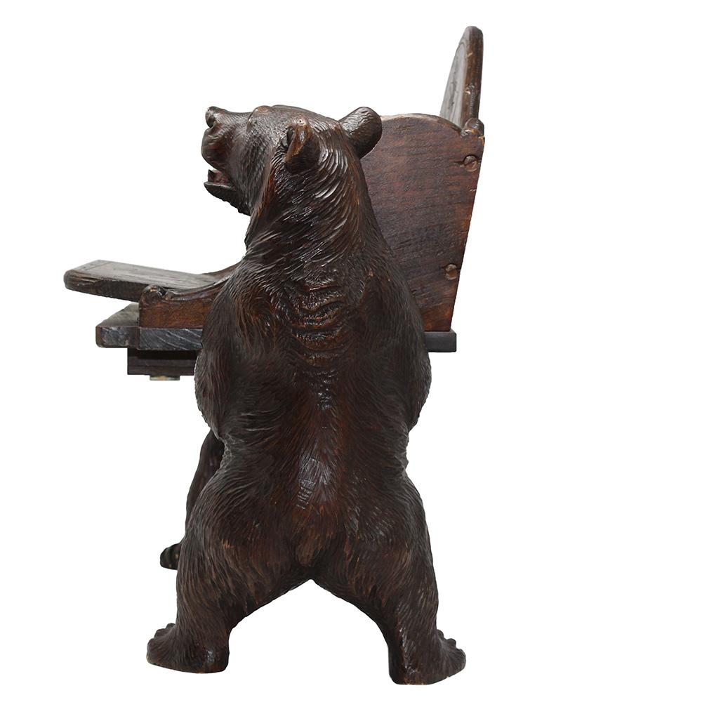 Musically activated when sat upon

From our Black Forrest collection, we are thrilled to offer this fine and rare Swiss Black Forest Bear carved musical child’s chair. The chair of beautiful form with twin bears standing up on two legs supporting