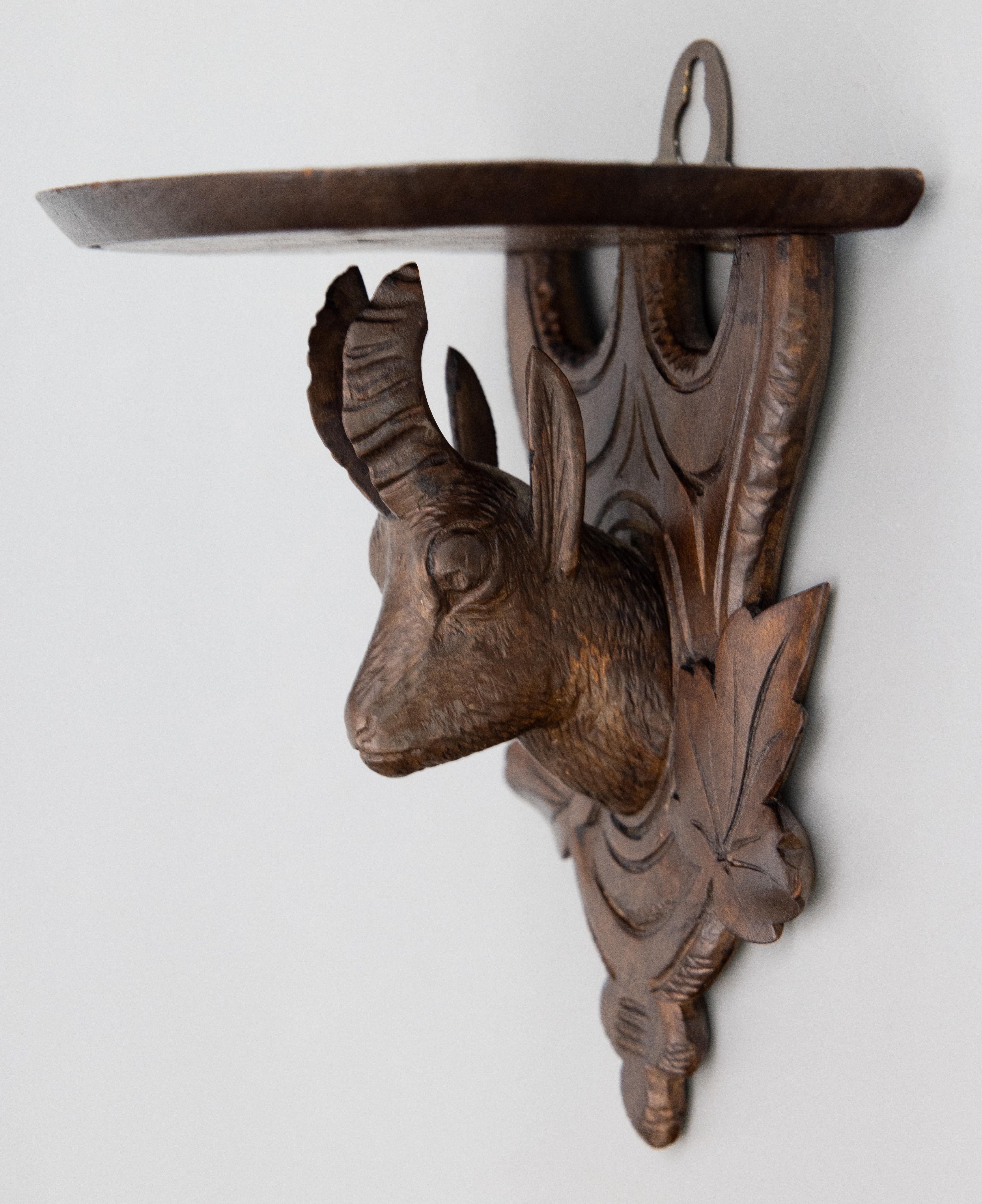Hand-Carved Antique Swiss Black Forest Carved Chamois Wall Bracket Shelf, circa 1920 For Sale