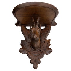 Antique Swiss Black Forest Carved Chamois Wall Bracket Shelf, circa 1920