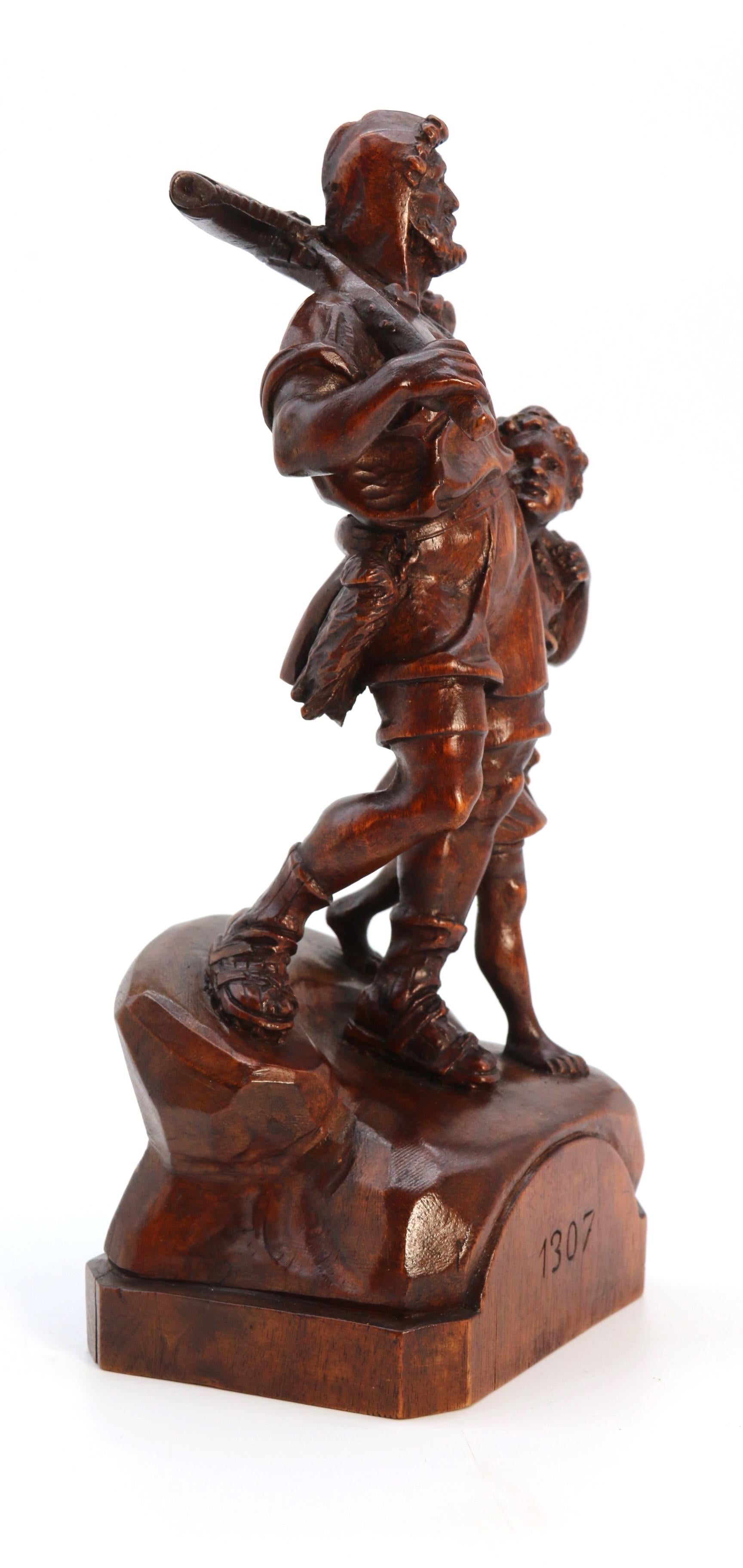 Antico studio in noce intagliato a mano della Black Forest svizzera raffigurante William Tell e suo figlio in vendita 3