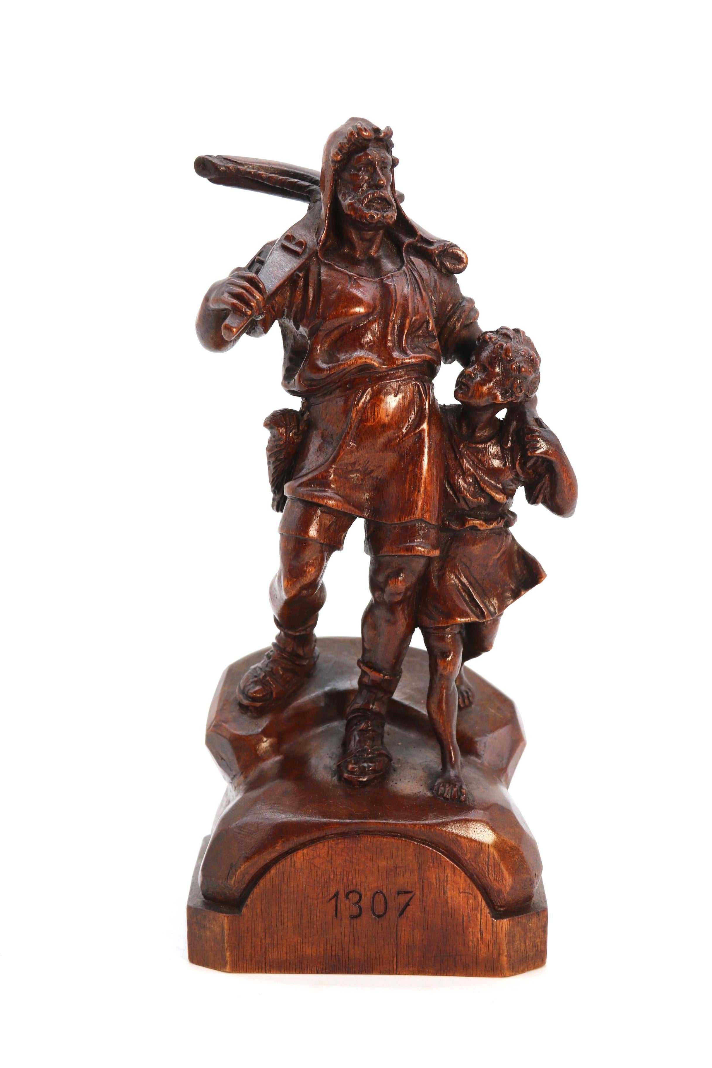 Foresta Nera Antico studio in noce intagliato a mano della Black Forest svizzera raffigurante William Tell e suo figlio in vendita