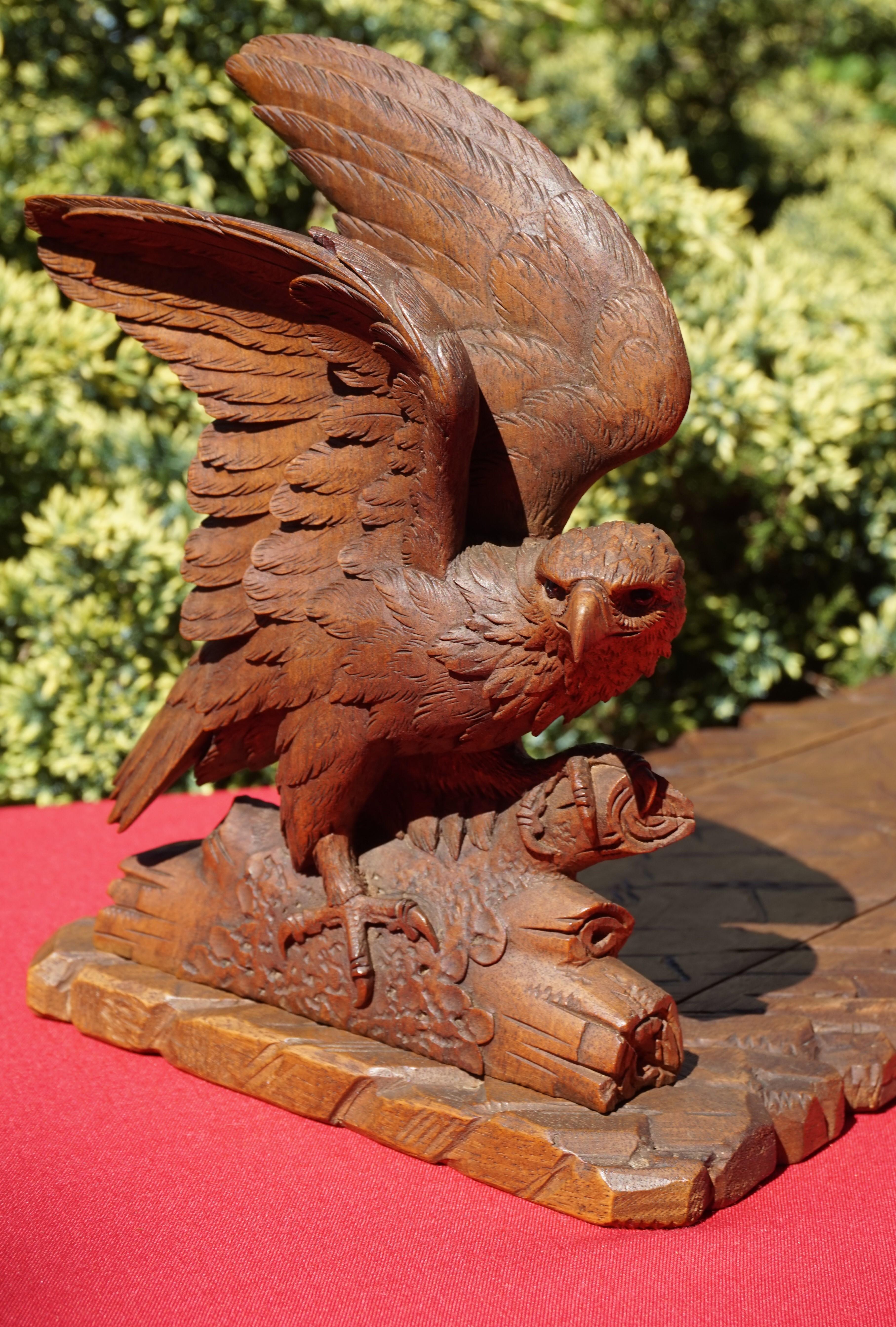 Hand-Crafted Swiss Black Forest Nutwood Books Rack or Stand with Carved Eagle Sculptures