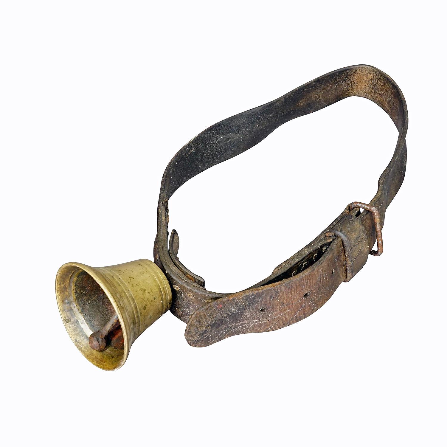 Antique Swiss Casted Bronze Cattle Bell ca. 1900s
Item e7314
An antique cast bronze cattle bell, made in Switzerland around 1900. The bell comes with its original brown leather strap with buckle. Bells like this are still used today to locate cows,