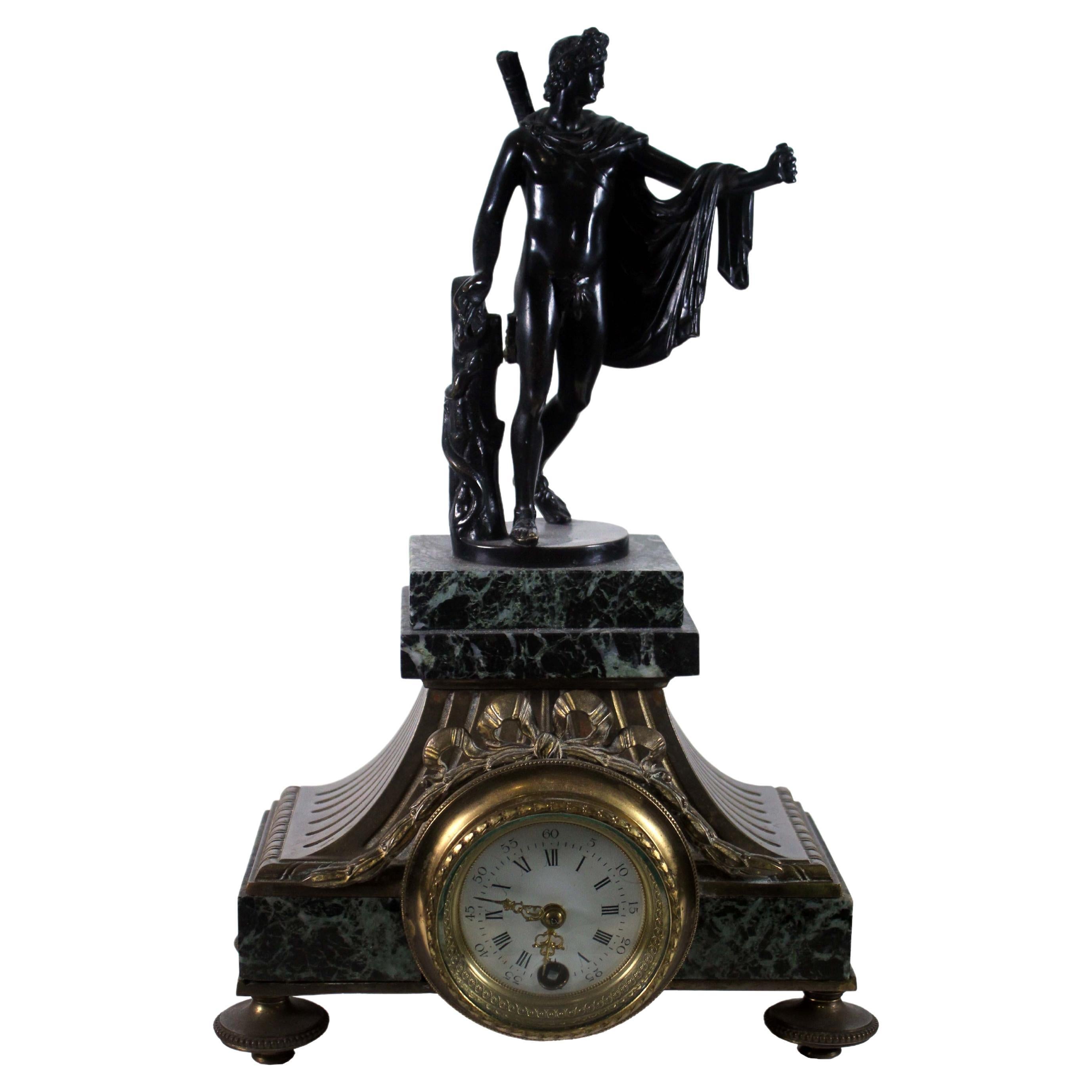 Ancienne horloge suisse Lenzkirich en fer et bronze représentant l'Apollon, estampillée 1388 en vente