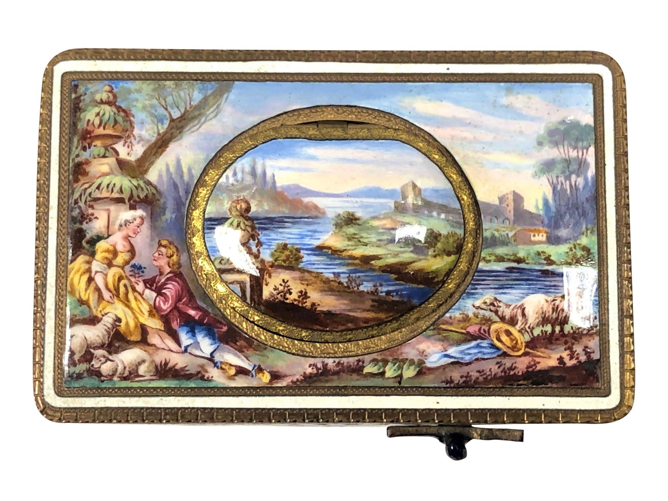 Circa 1930s Bird Box Music Box, Enamel On Gilt Brass with a scenic depiction on the top, the box measures 4 X 2 1/2 X 1 3/4 inches. Mechanical spring wind movement that operates a Feathered covered Bird that through a series of mechanics is revealed