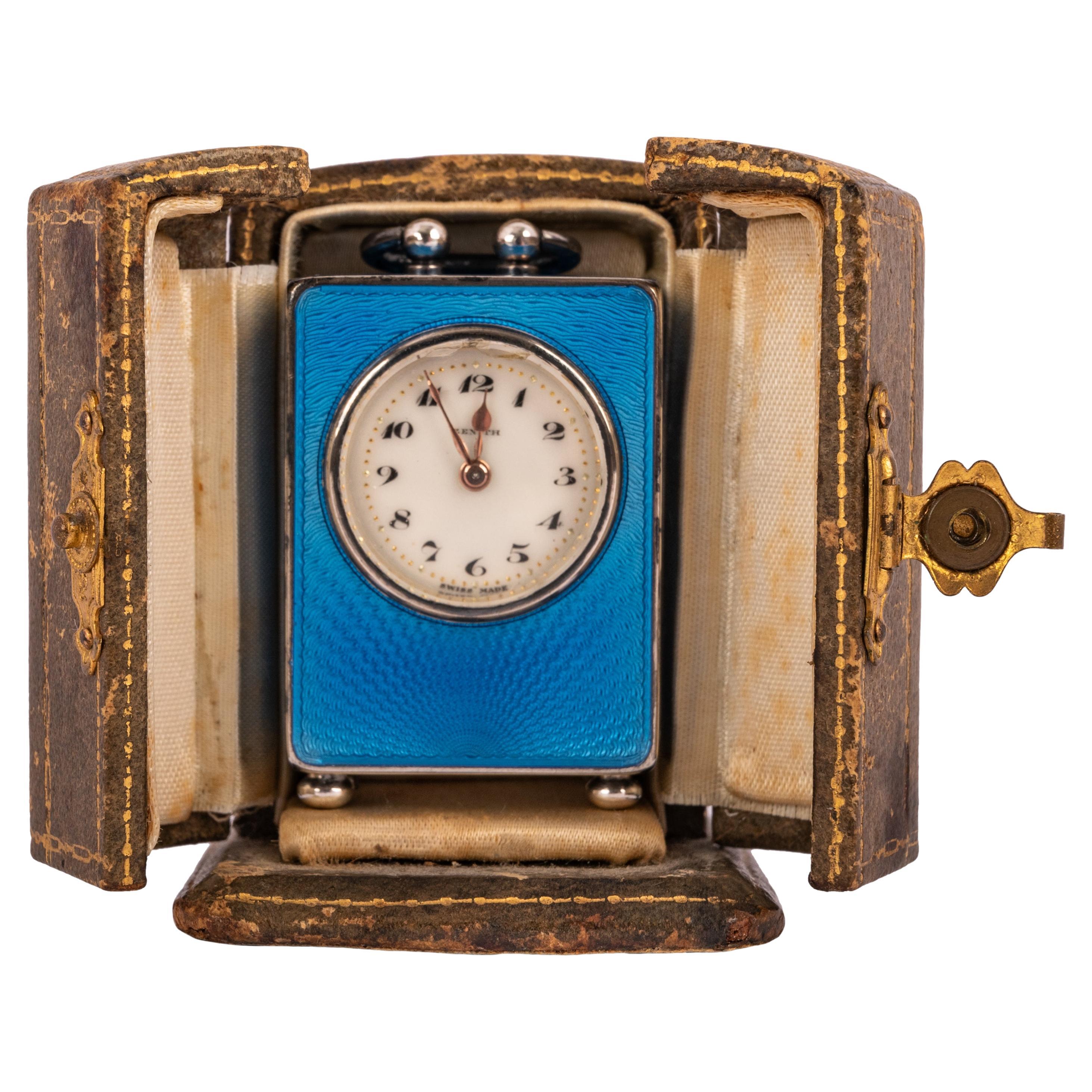 A fine & exceptional antique Swiss silver & Guilloche enamel miniature carriage clock & case, circa 1910.
The clock complete with the original leather case, made of sterling silver and beautiful blue guilloche enamel. The clock with an eight day