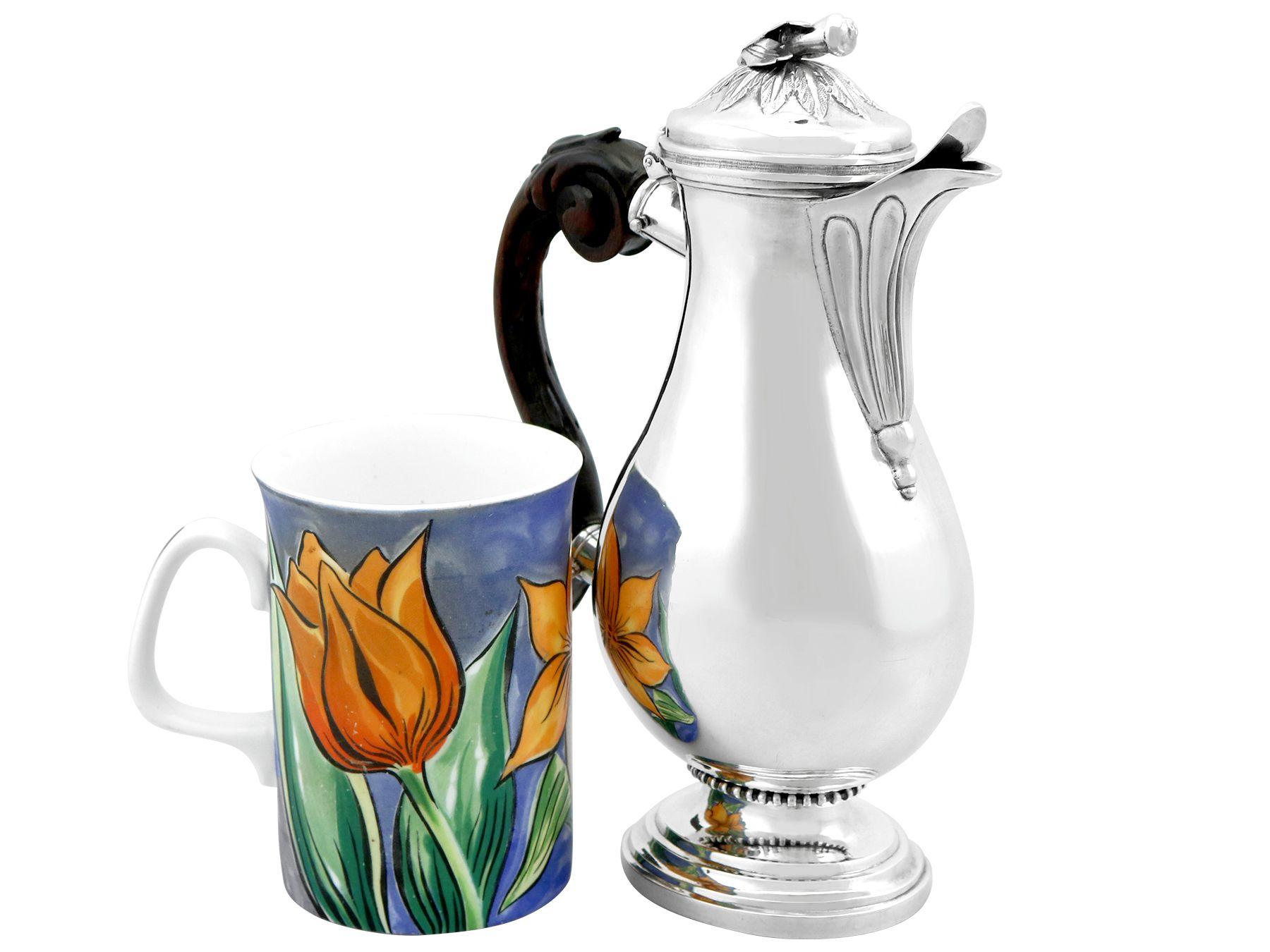 An exceptional, fine and impressive antique Swiss silver coffee jug; an addition to our 18th century silver teaware collection

This exceptional antique Swiss silver coffee jug has an oval baluster form onto an oval pedestal foot.

The surface