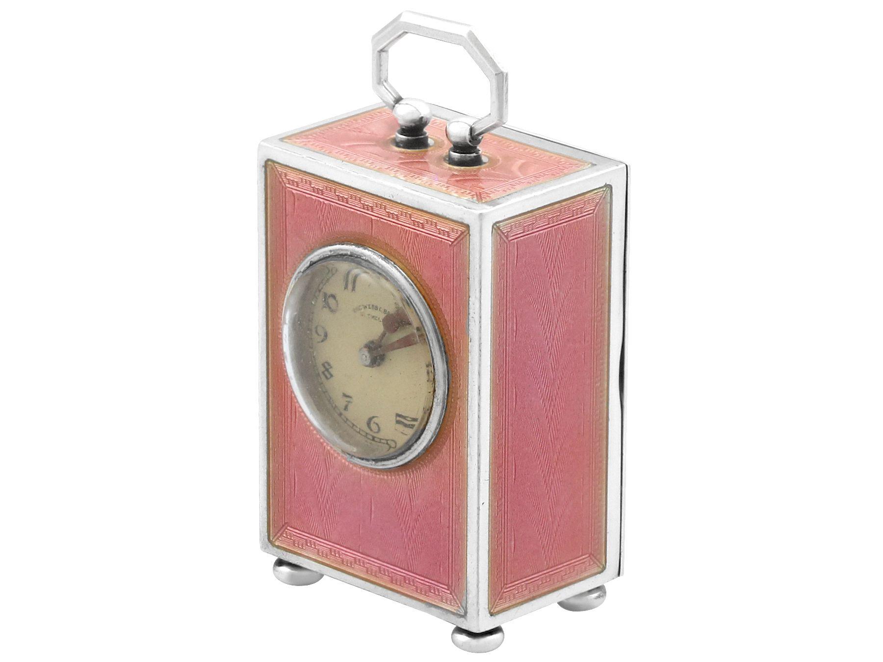 An exceptional, fine and impressive, antique Swiss silver and pink enamel miniature boudoir clock; an addition to our silver timepiece collection.

This exceptional antique Swiss silver miniature boudoir clock has a plain rectangular form.

The