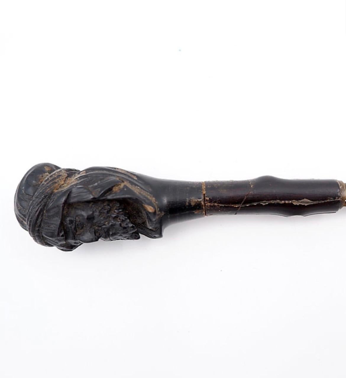 Ancien bâton de sabre avec tête sculptée en vente 6