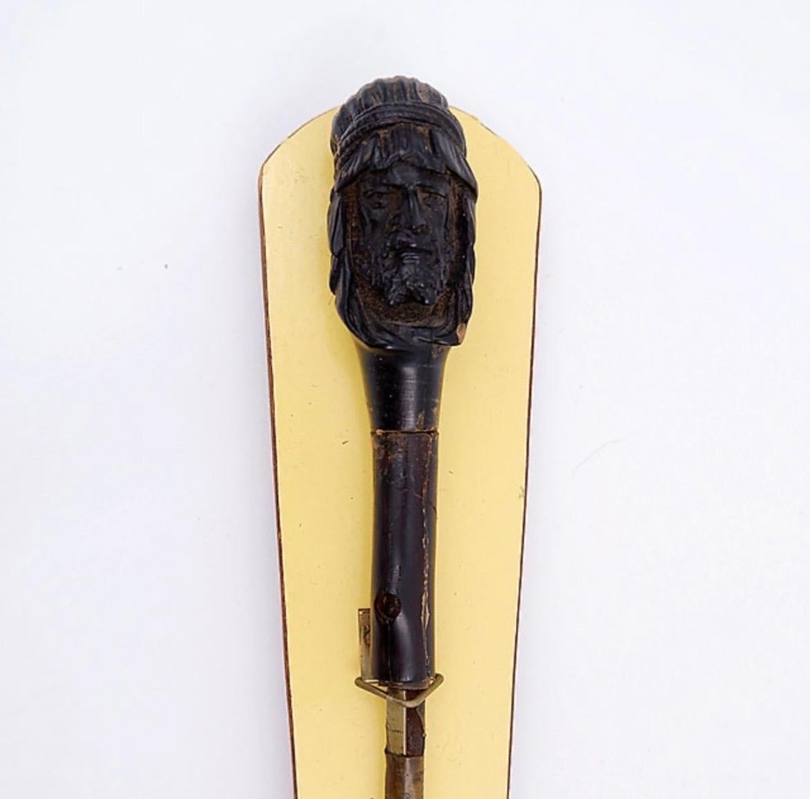 Ancien bâton de sabre avec tête sculptée en vente 7