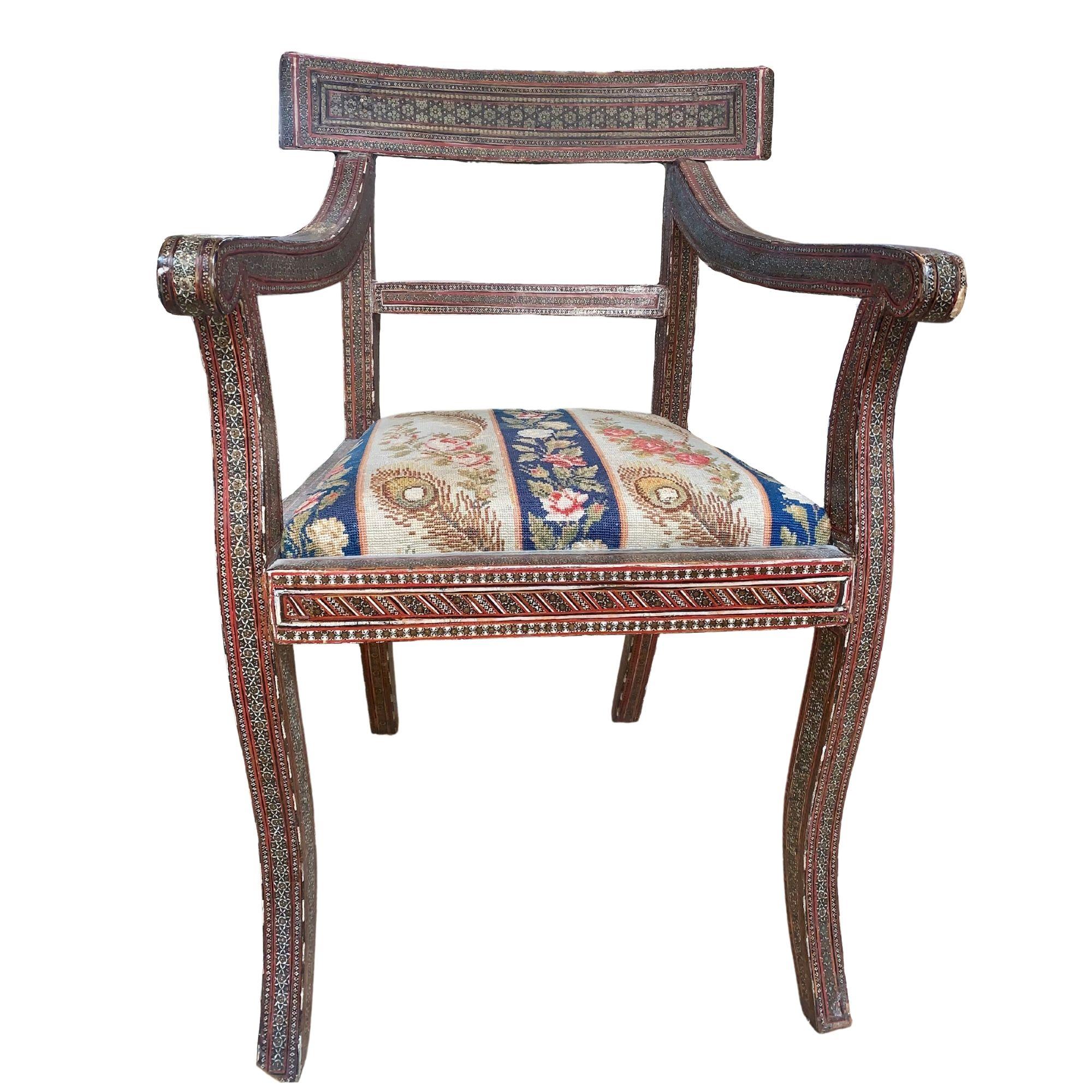 Antique Syrian chair with beautiful inlay and old needlepoint cushion.