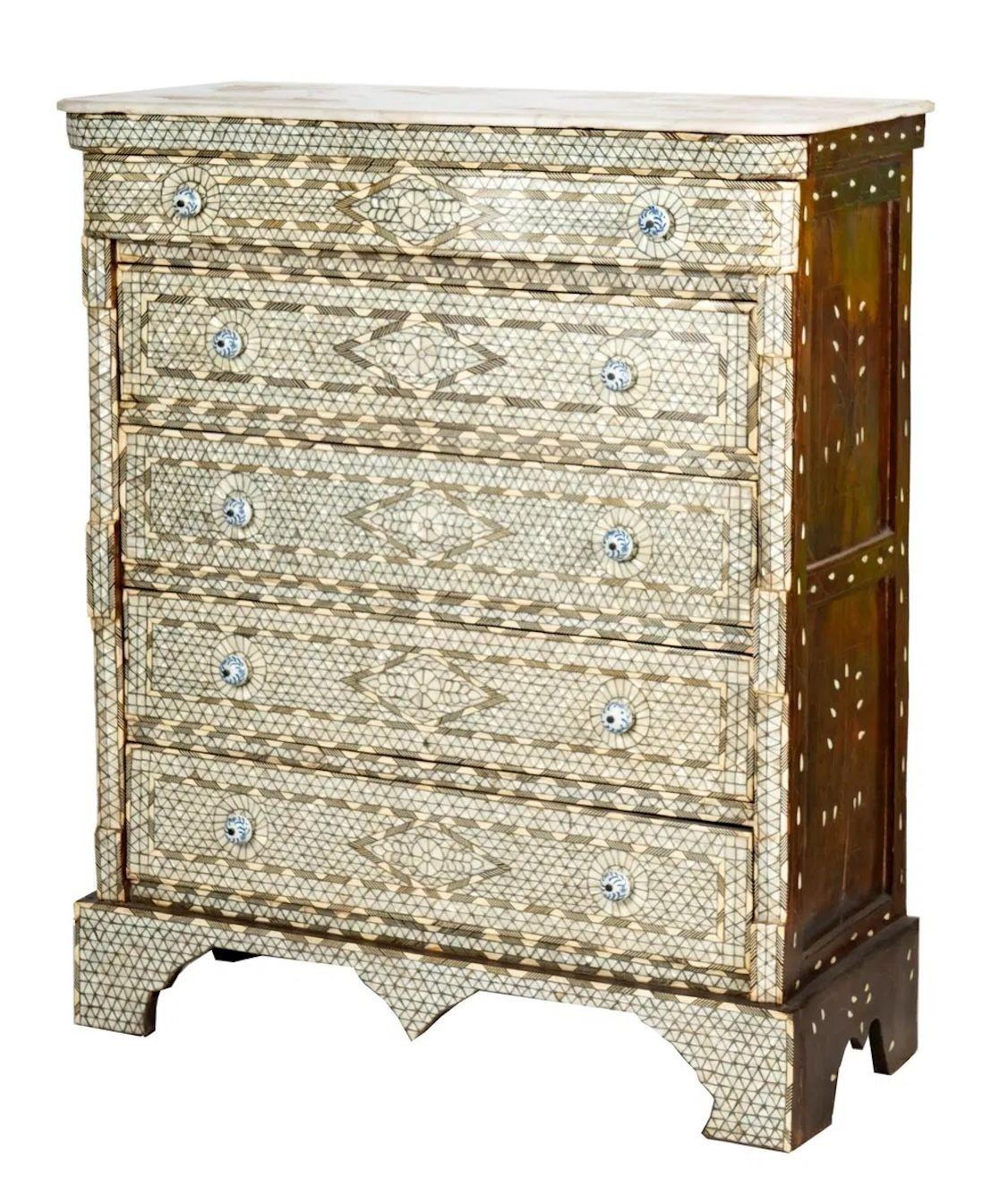 Antique Syrian Mother-of-Pearl Inlaid Marble-Top Chest of Drawers, Early 20th Century.
Luxury Antique Syrian Mother-of-Pearl Inlaid Marble-Top Chest of Drawers  Moorish Moroccan Orientalist Furniture, Early 20th Century.
A magnificent Syrian Moorish