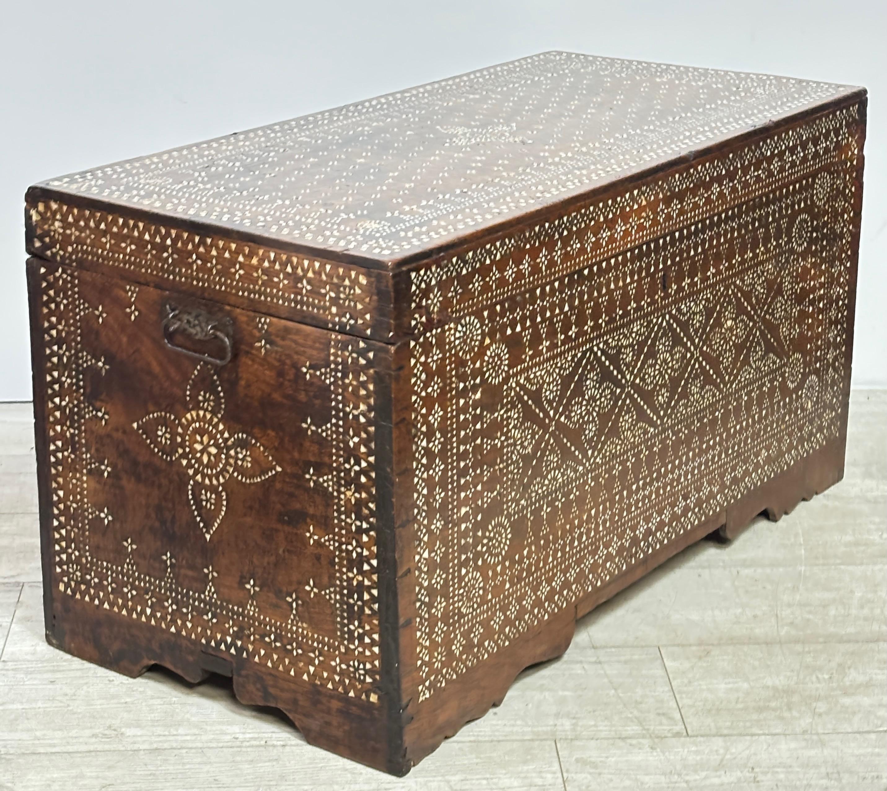Antique Moorish style trunk with bone inlay detail.
Late 19th Century.
These always make for an interesting coffee table or for blanket storage at the end of a bed.
In good condition with some minor inlay loss (but not apparently visible).
