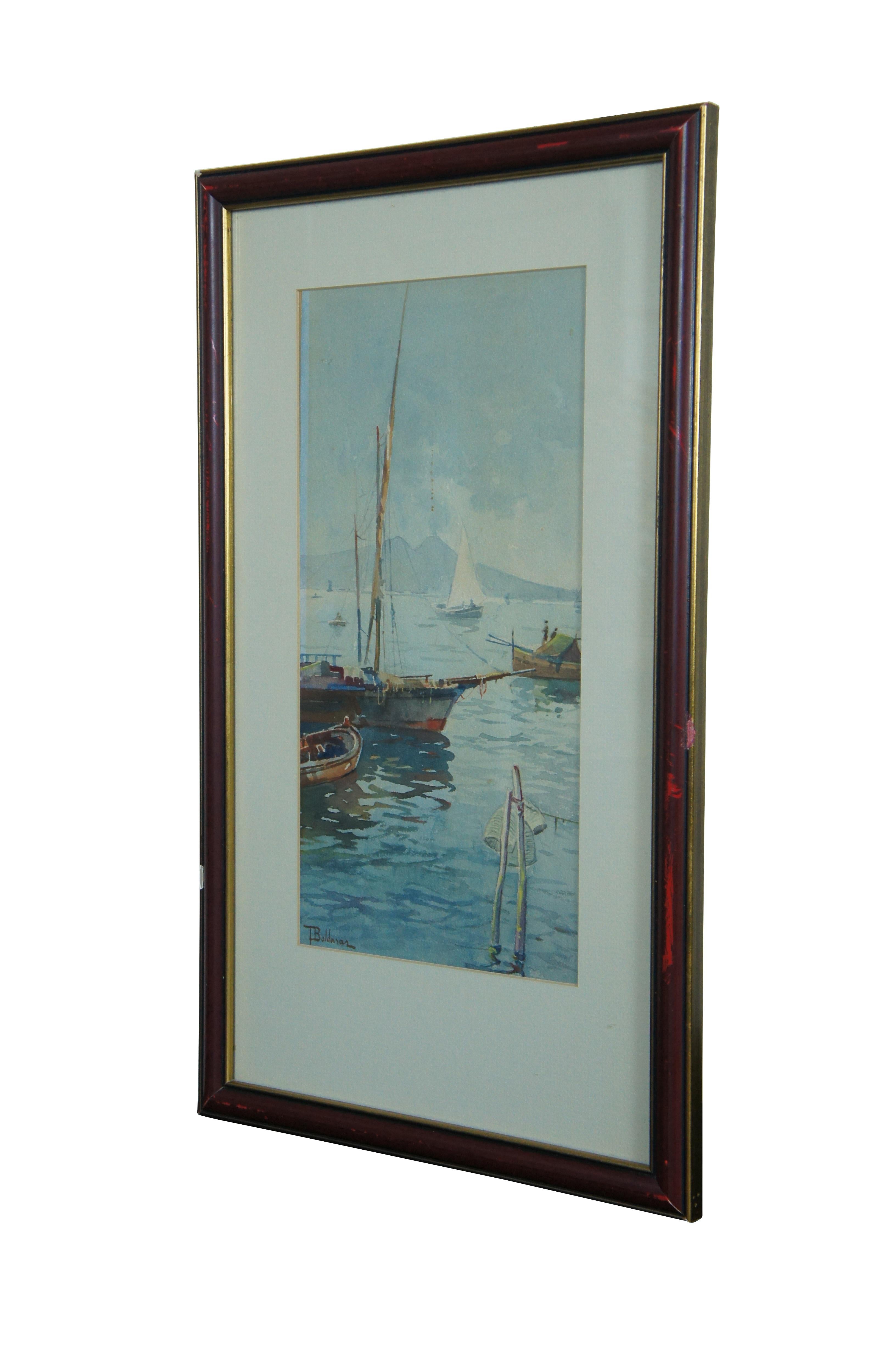 Early 20th century original watercolor painting by T. Baldasar, showing an array of sailboats in a harbor with mountains in the background. Signed lower left corner. Red painted frame with raised bevel and gilt edges; white mat.

Dimensions:
12.75