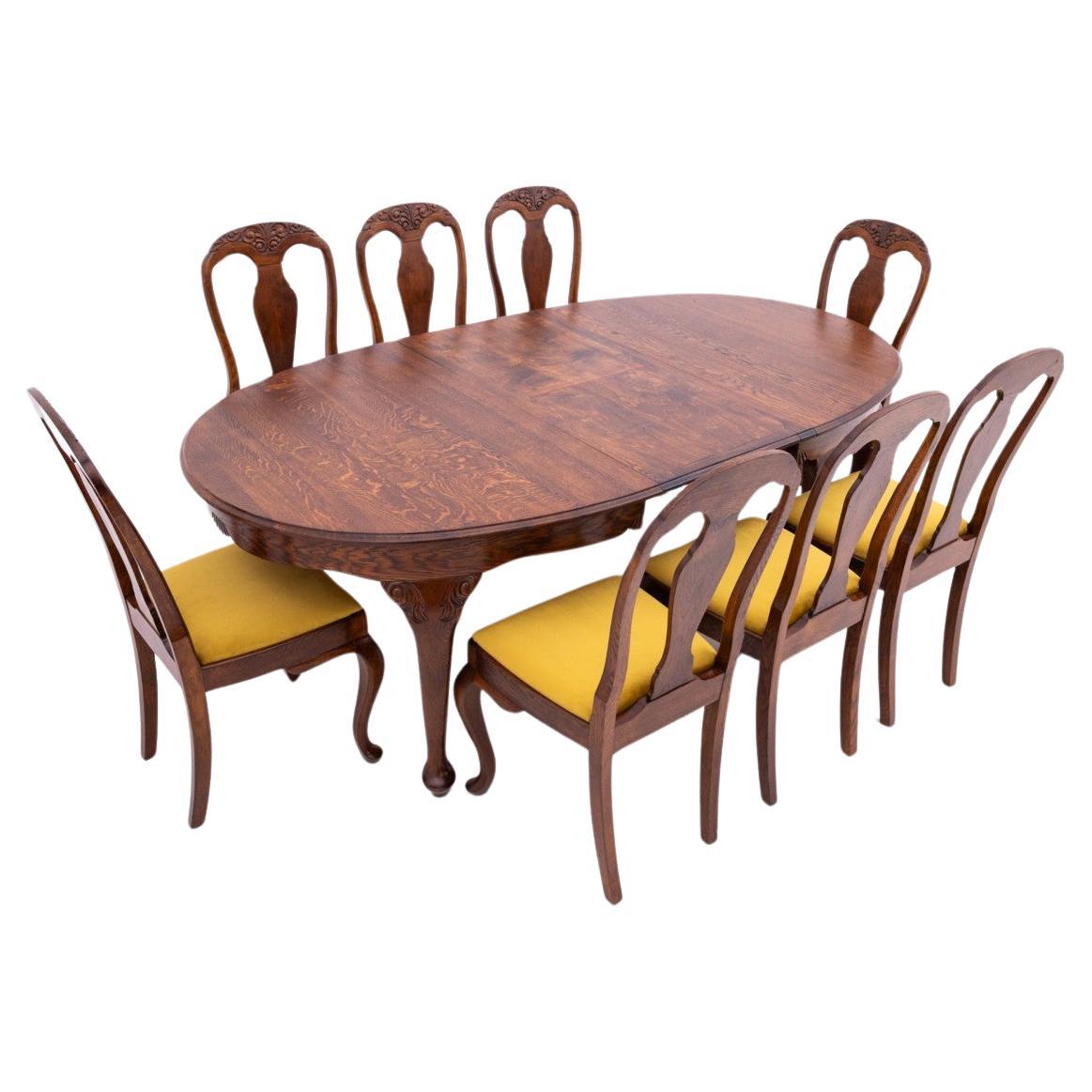 Antique table + 8 chairs, Northern Europe, circa 1920. AFTER RENOVATION For Sale