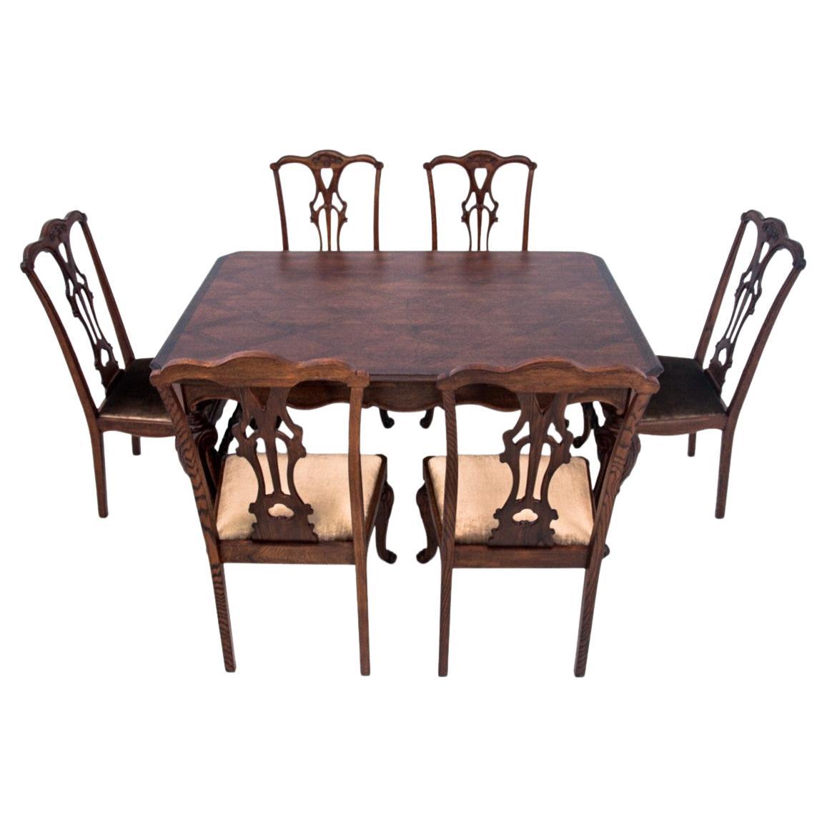 Antique table and chairs from the 19th century, Western Europe.