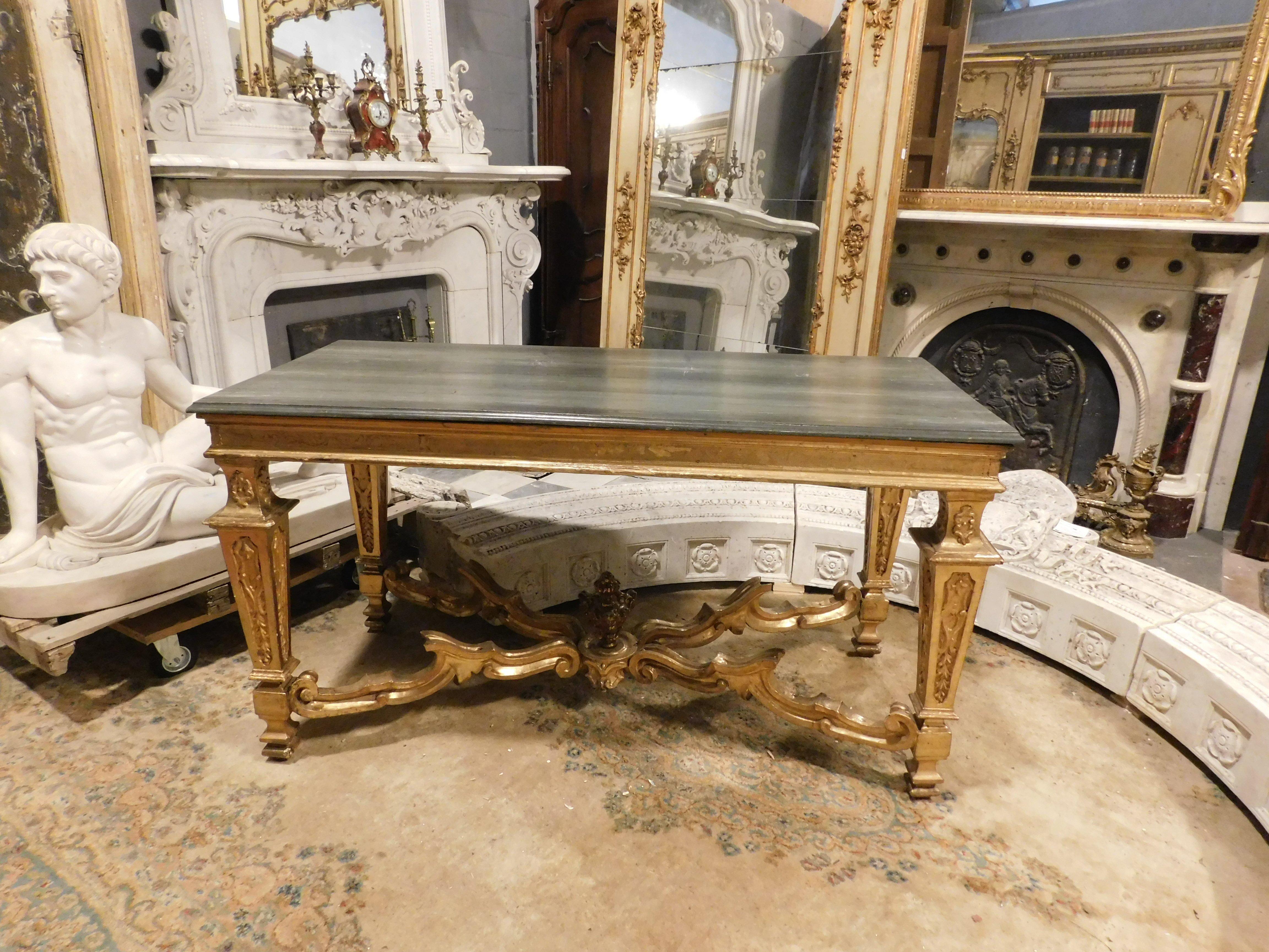 Antique table-console in poplar wood, lacquered and gilded by hand, richly carved and gilded on the legs with a very elaborate central cross. complete with lacquered wooden top. Perfect for multiple furnishing solutions, a beautiful presence both in