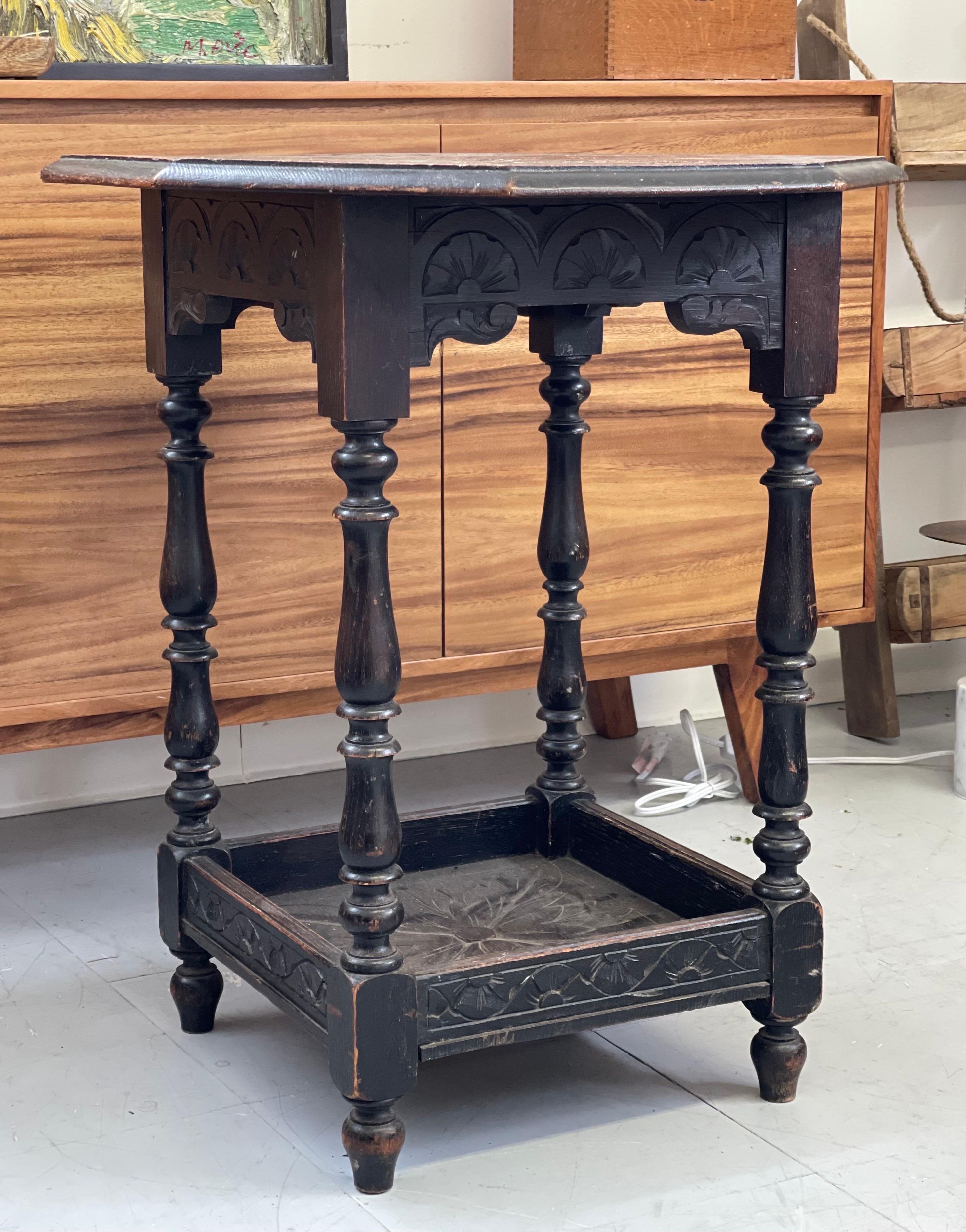 Antique Table Stand. Uk Import. This Table has Primitive Style and hand Carved Floral Design on Both levels and has Great Character patina to the Wood.

Dimensions. 23 1/2 W ; 23 1/2 D ; 28 H.