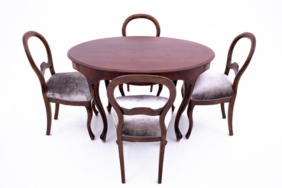 Antique table with chairs, Northern Europe, around 1870.