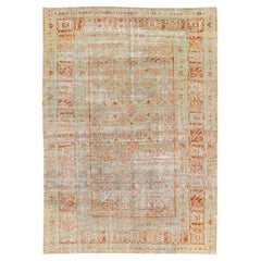 Antiker handgefertigter Teppich aus persischer Wolle in Täbrisblau und Rost mit Allover-Muster
