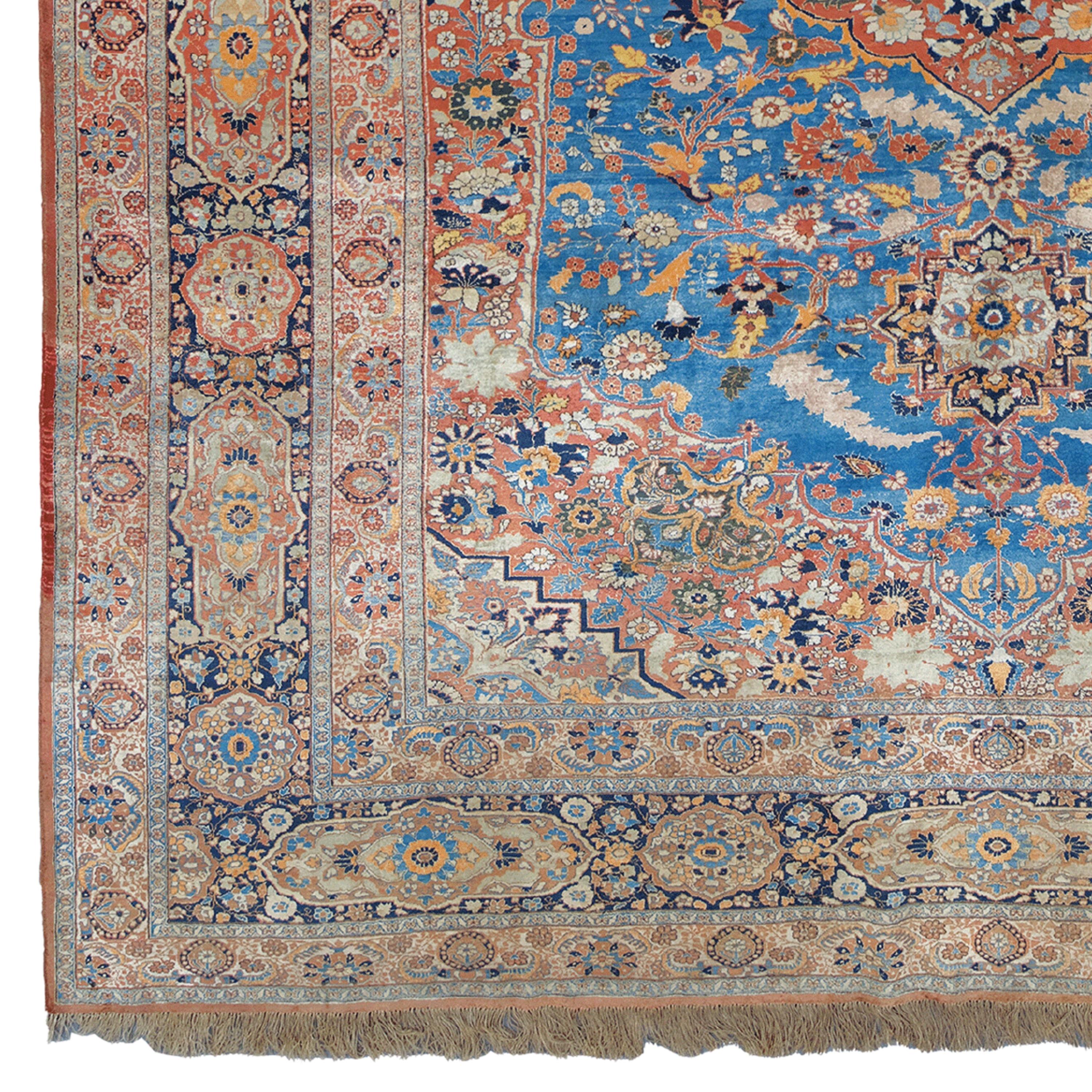 19th Century Silk Tabriz Carpet

This elegant 19th-century silk Tabriz rug adds nobility to any space with its historical beauty and sophisticated craftsmanship. Presenting the harmony of blue, beige and red, this work is eye-catching with its