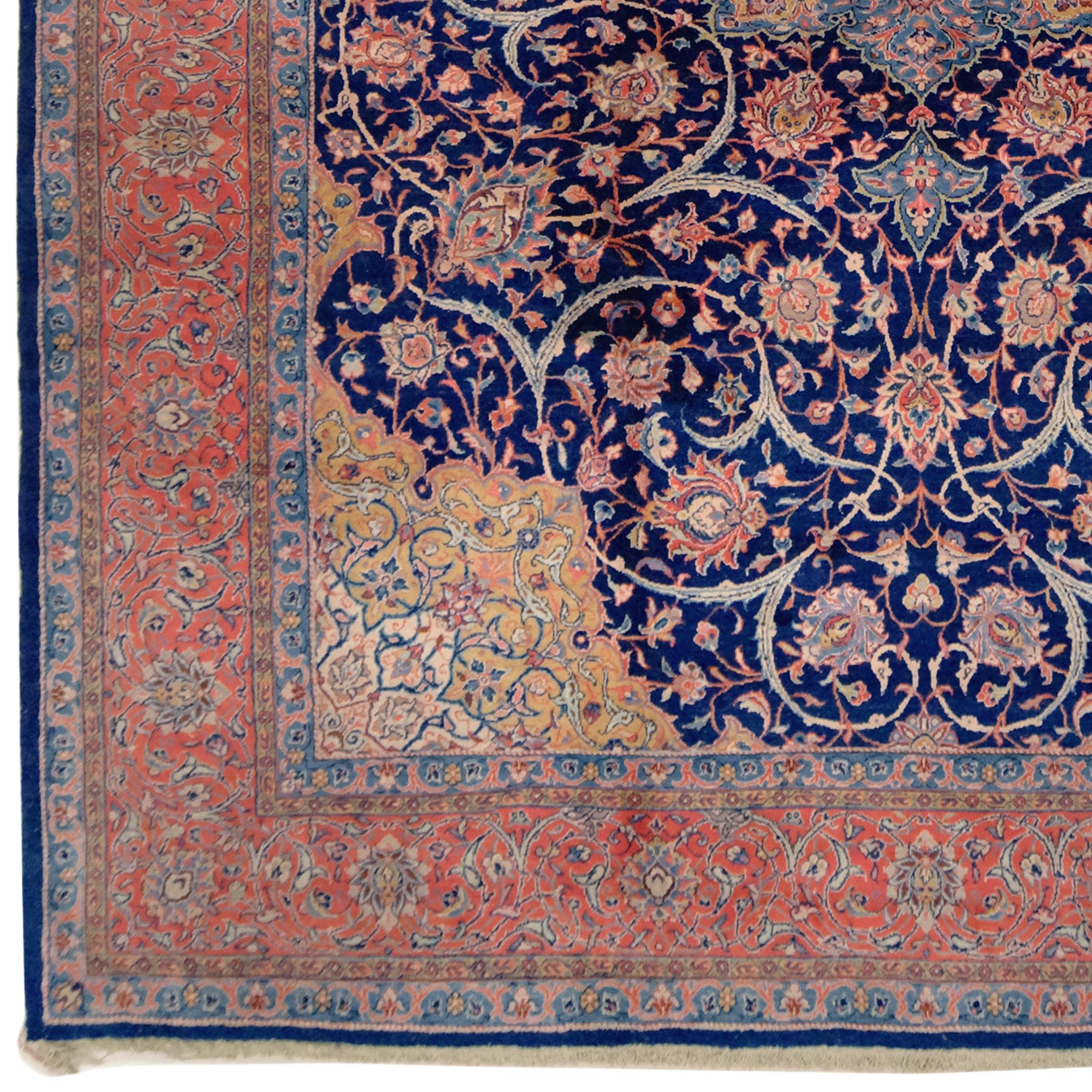This unique Tabriz carpet was meticulously crafted in one of Iran's most renowned carpet-weaving centers in the late 20th century. Its exquisite patterns in striking blue and red hues make it one of the most magnificent examples of traditional