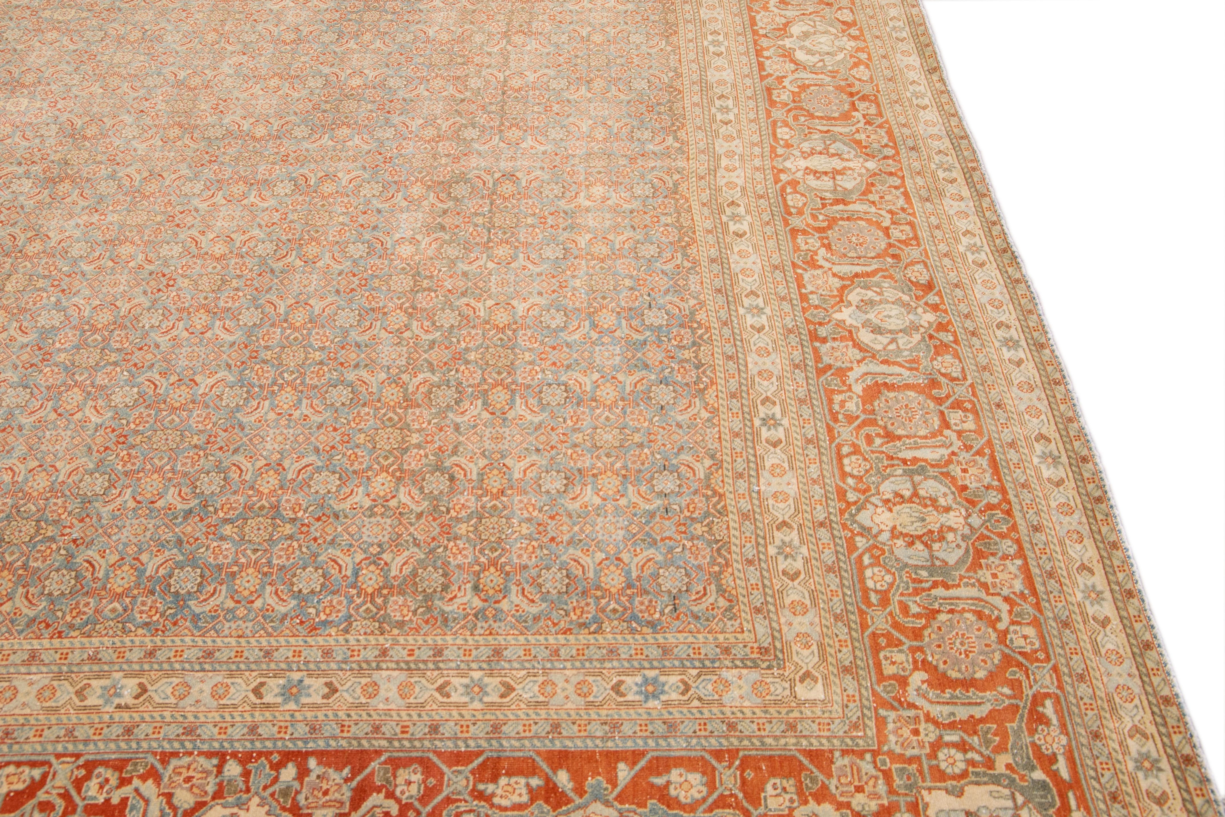 Tapis persan ancien en laine bleu et rouille Tabriz, fait à la main et entièrement conçu à la main en vente 1