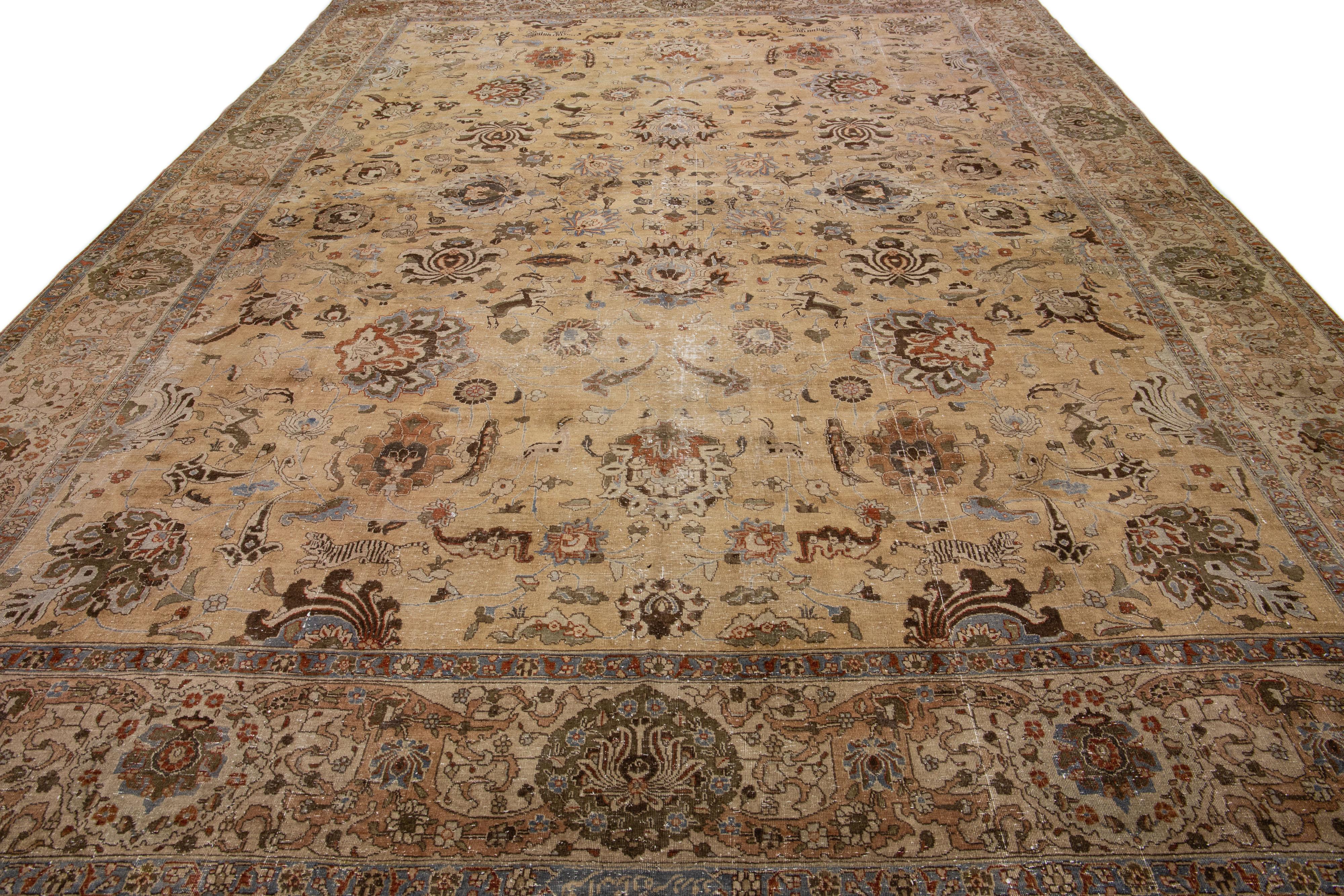 Hand-Knotted Antique Tabriz Handmade Brown Persian Wool Rug with Floral Motif For Sale