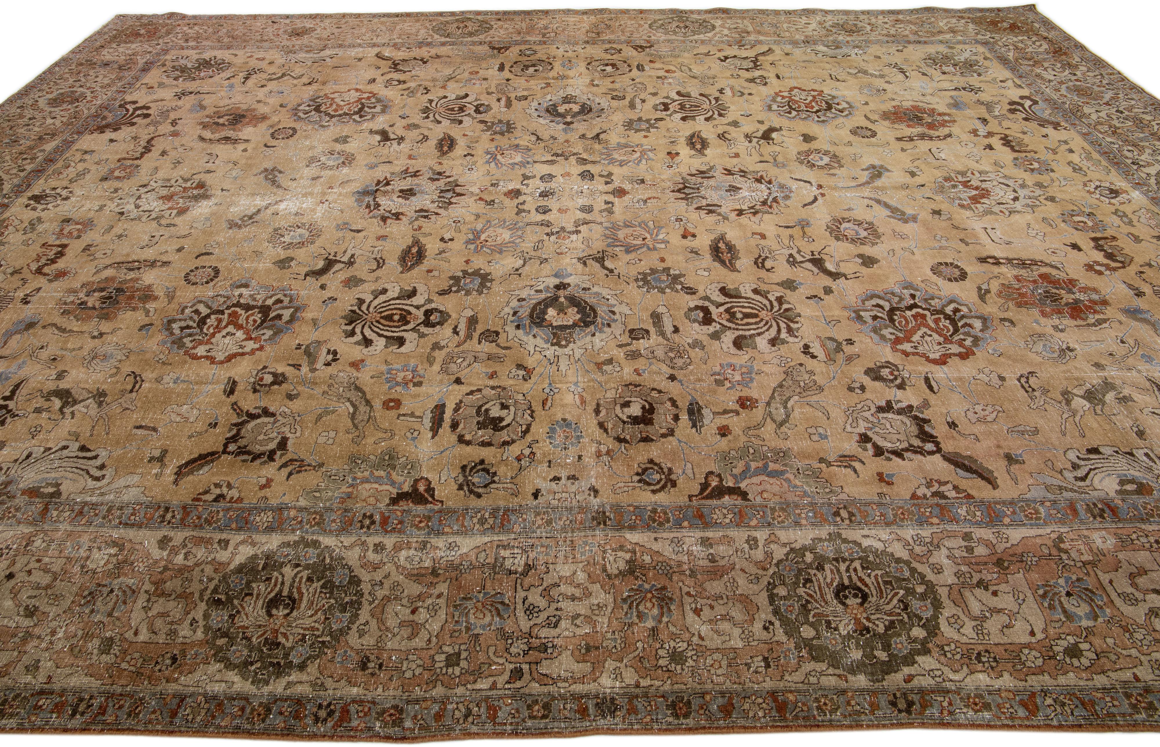 20th Century Antique Tabriz Handmade Brown Persian Wool Rug with Floral Motif For Sale