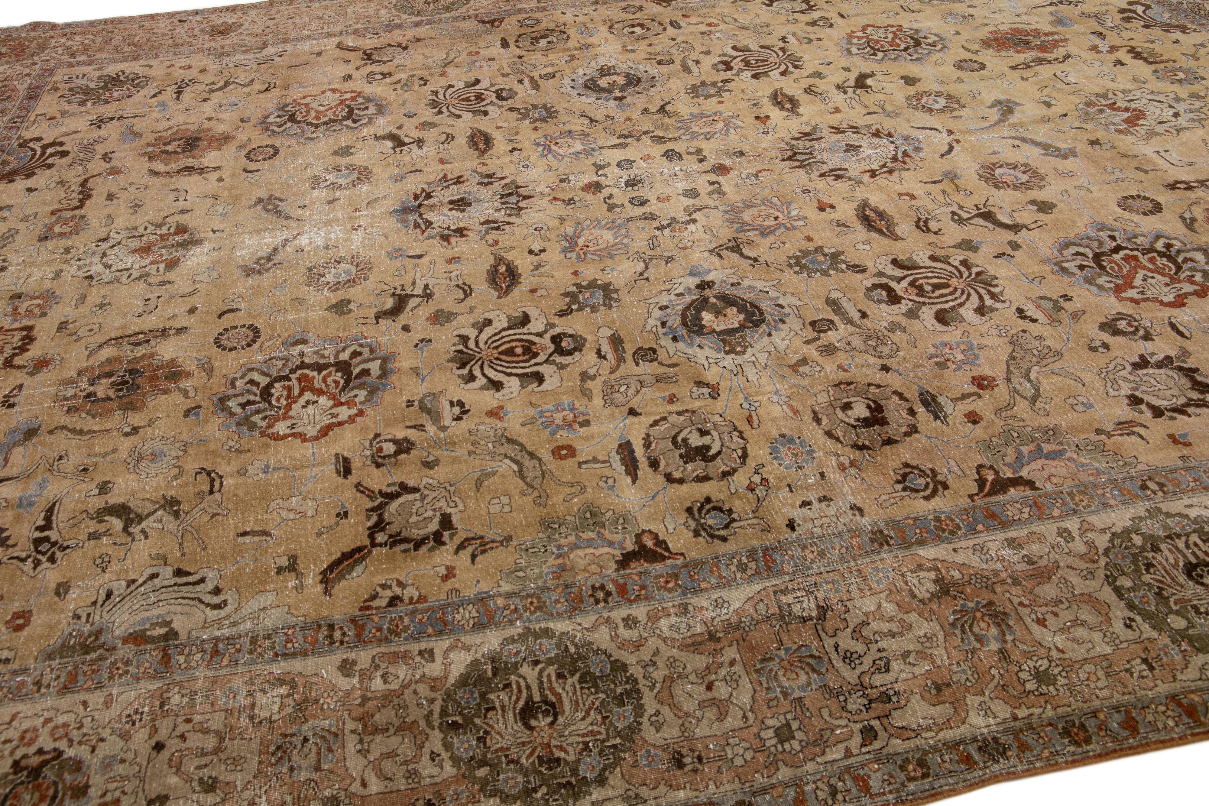 XX secolo Antico tappeto Tabriz in lana persiana marrone fatto a mano con motivo floreale in vendita