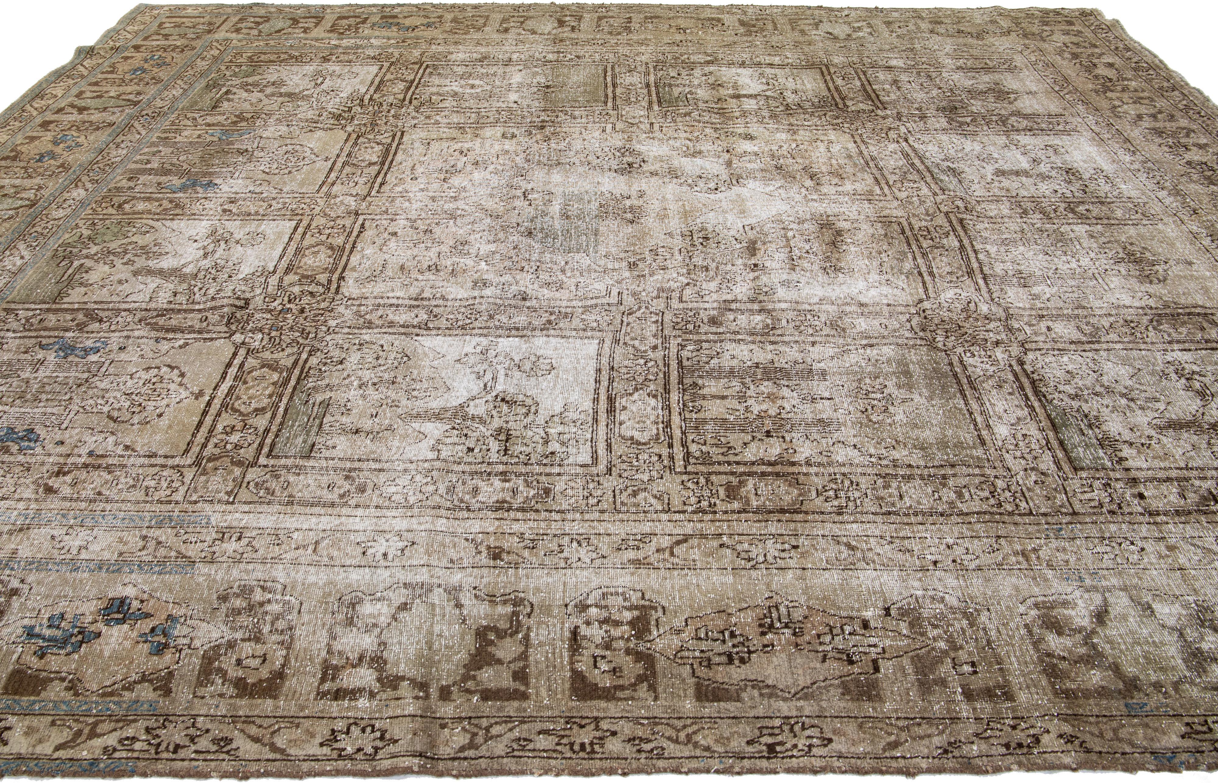 20th Century Antique Tabriz Handmade Floral Persian Brown Wool Rug For Sale