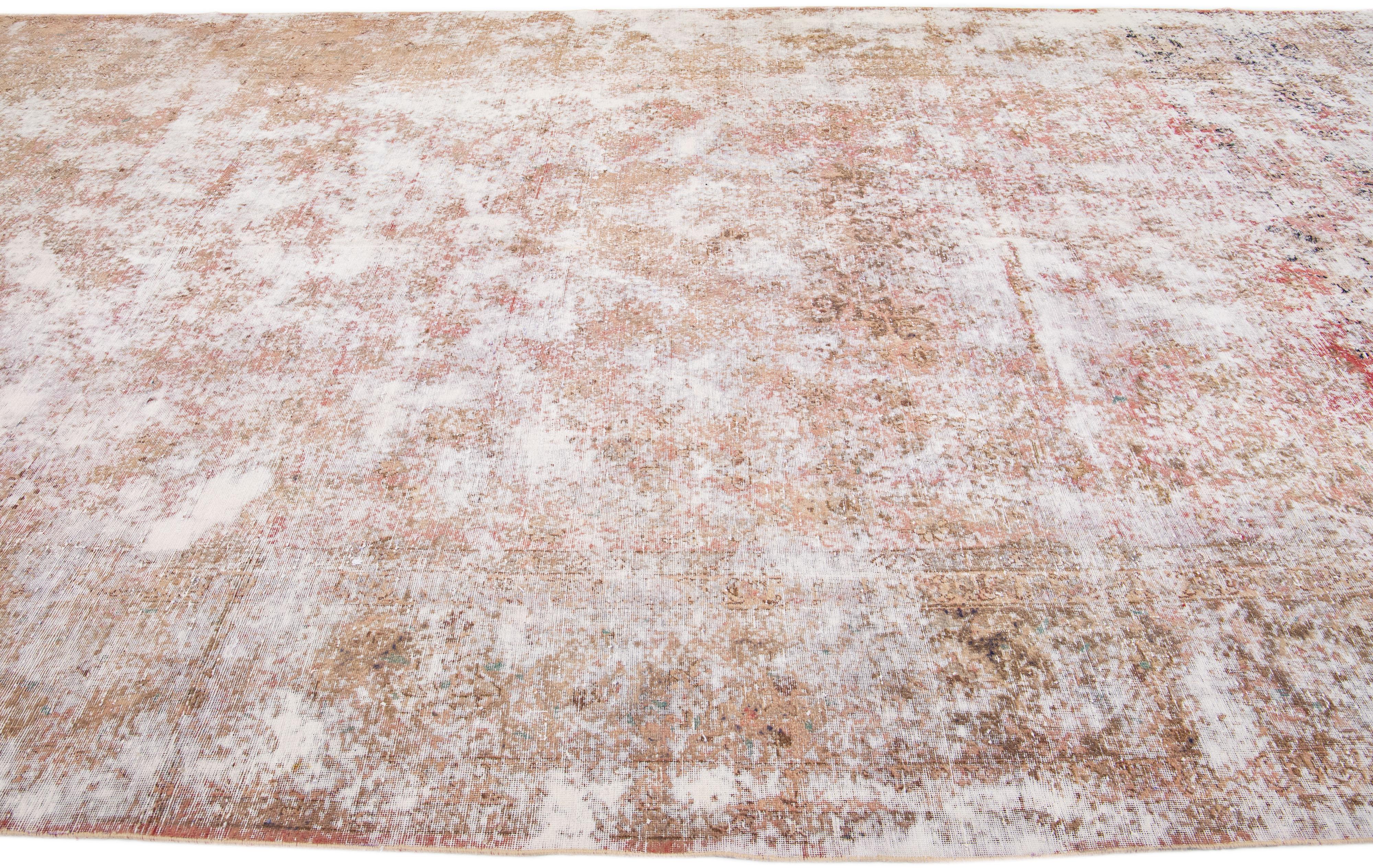 Early 20th Century Antique Tabriz Handmade Rust Distressed Persian Wool Rug For Sale