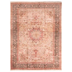 Antique Tabriz Medallion-Style Pink Wool Rug with Floral Patterns