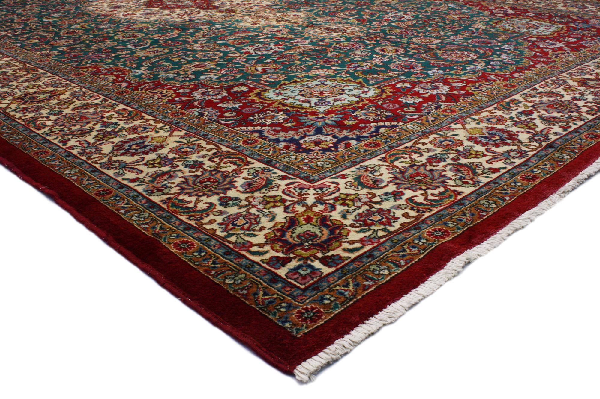 74989 Antique Tabriz Persian Palace Rug with Traditional Old World Style 09'11 X 16'01. This hand-knotted wool antique Tabriz Persian palace size rug features an all-over floral with a grand center medallion. The charmingly all-over pattern of