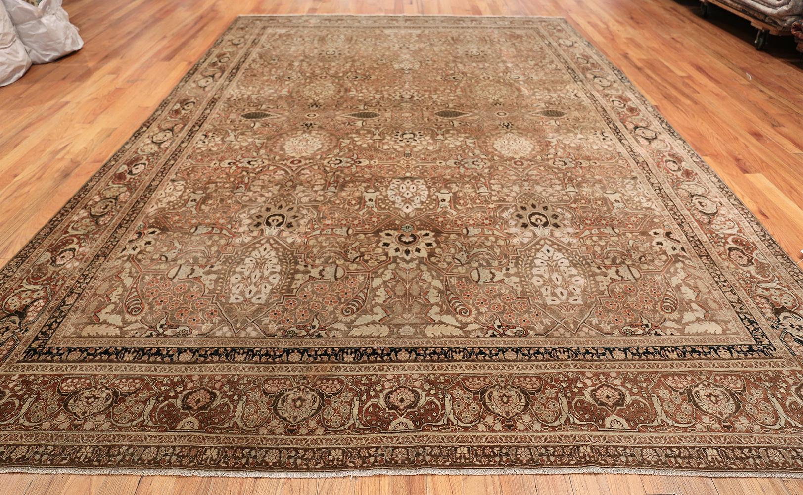 Antique Persian Tabriz rug, Country of origin: Persia, circa date: 1900 – A complex ‘Mina Khani’ pattern of vines and palmettes unfolds in all-over symmetry across the field of this supremely elegant antique Tabriz. A mesh of delicate vines entirely